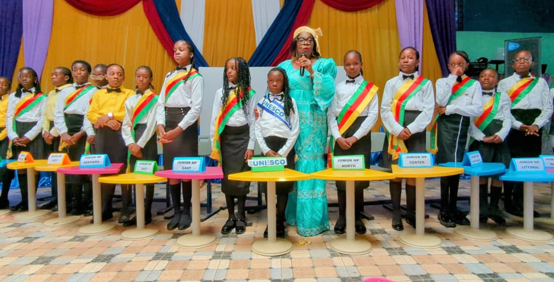 woman wearing yellow long-sleeved dress under white clouds and blue sky during daytime