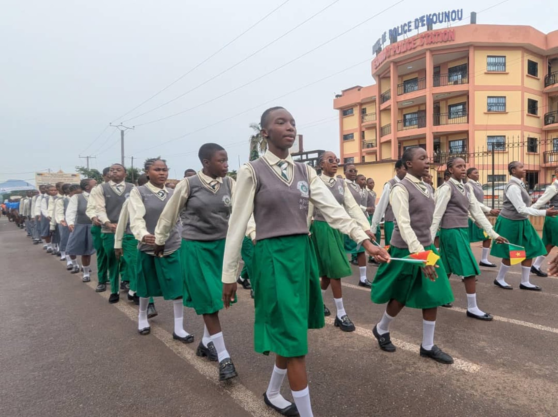 woman wearing yellow long-sleeved dress under white clouds and blue sky during daytime