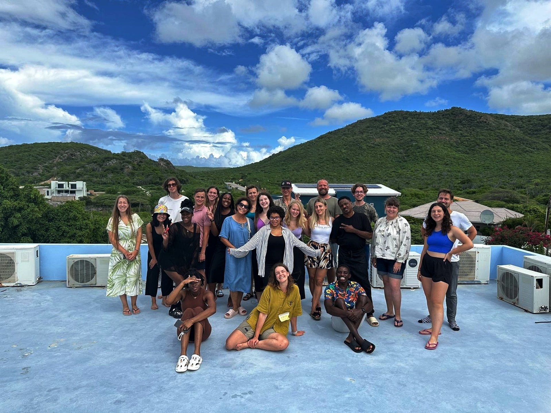 black and brown leather padded tub sofa