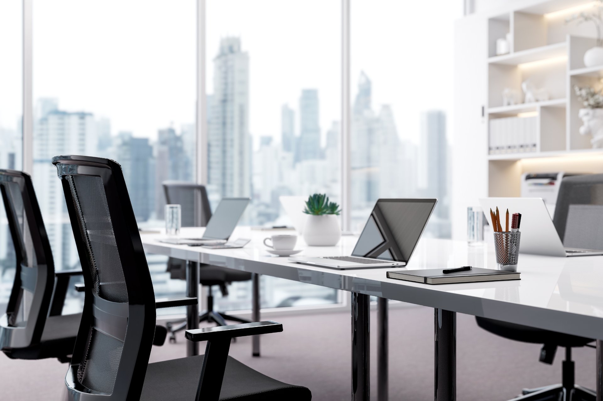 man holding smartphone looking at productivity wall decor