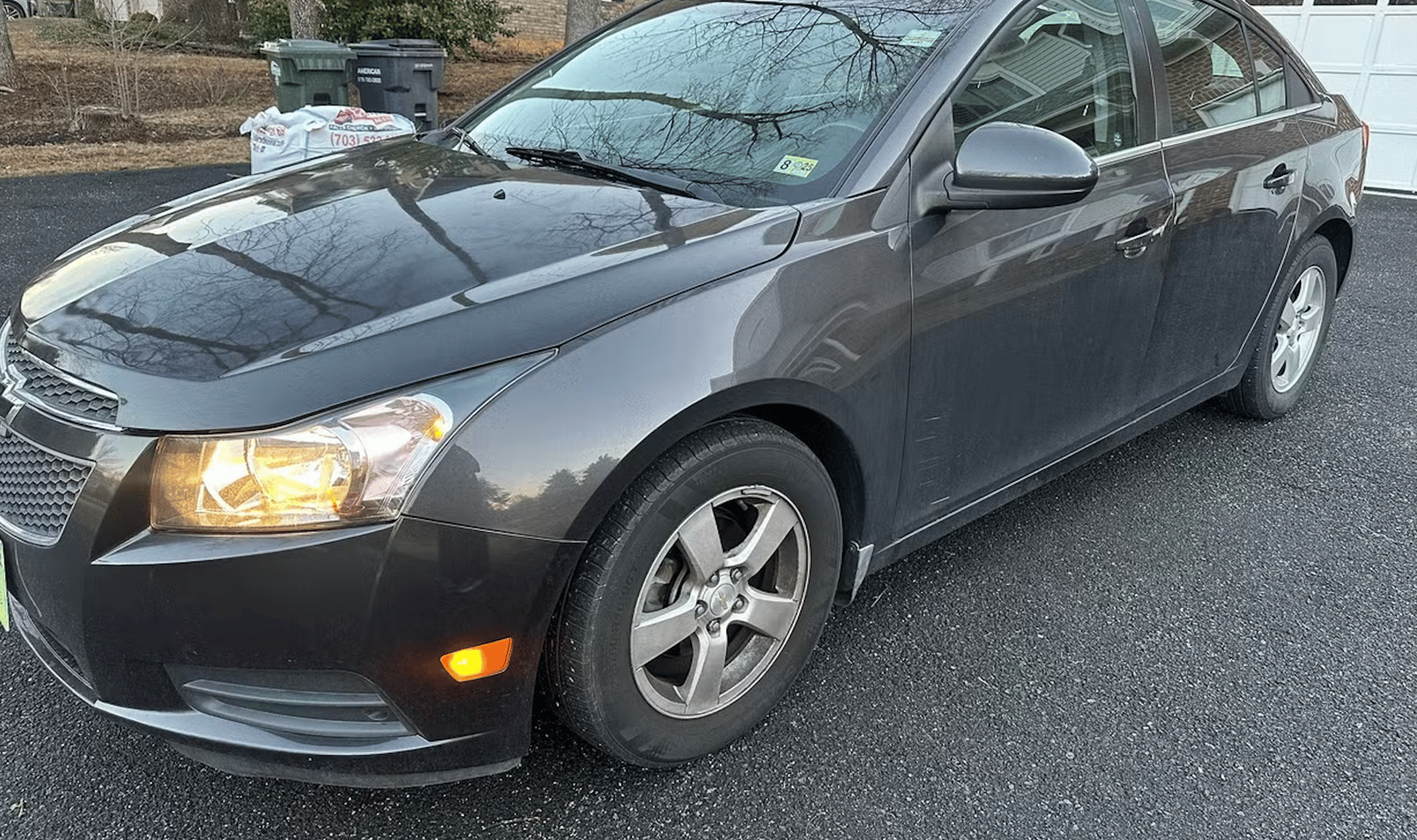 shallow focus photo of person driving Honda car