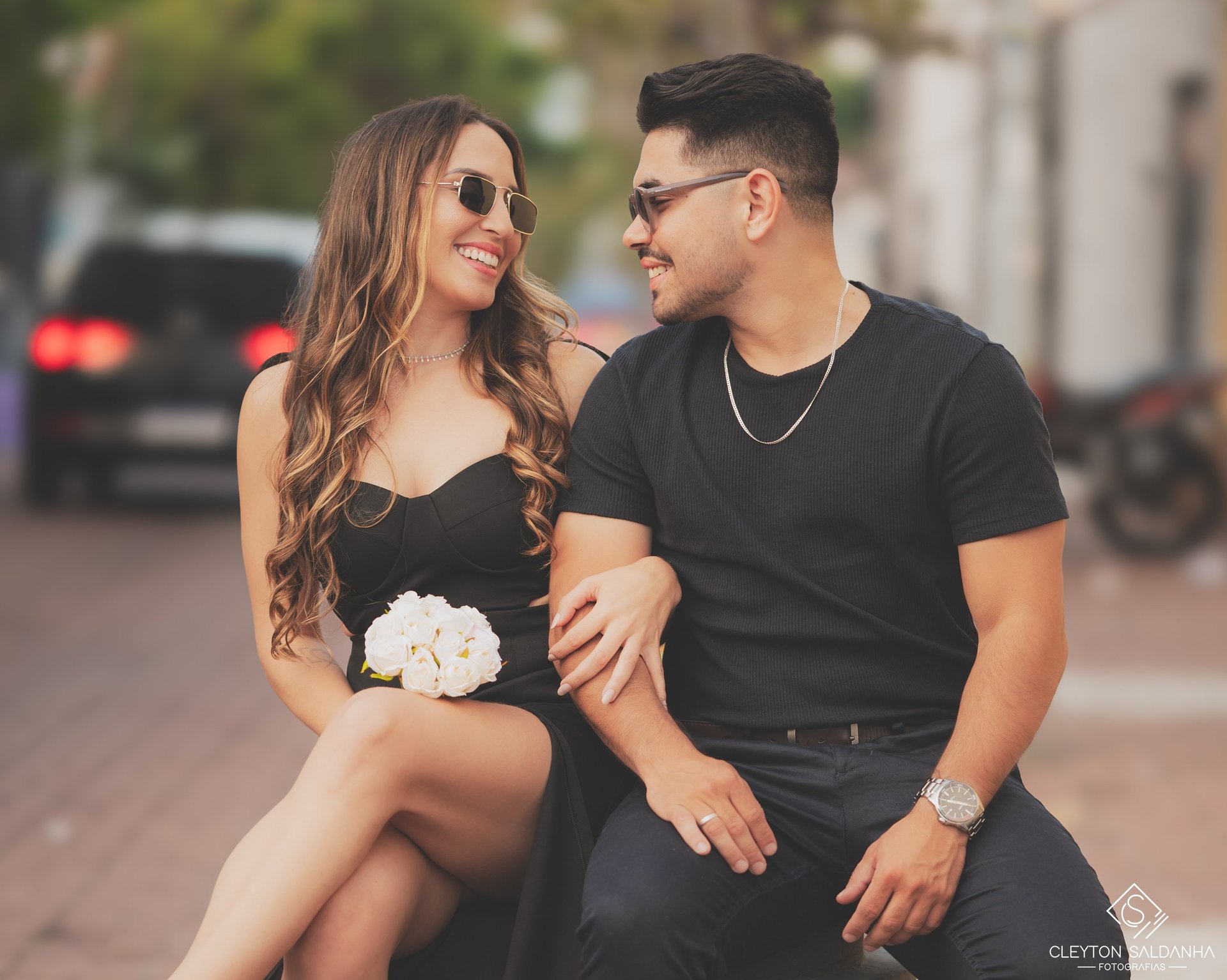 couple wearing silver-colored rings