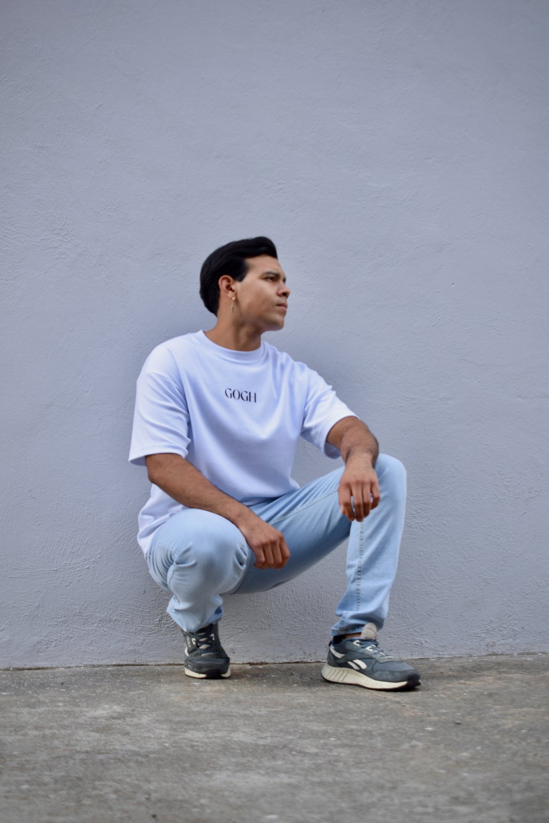 woman wearing yellow long-sleeved dress under white clouds and blue sky during daytime