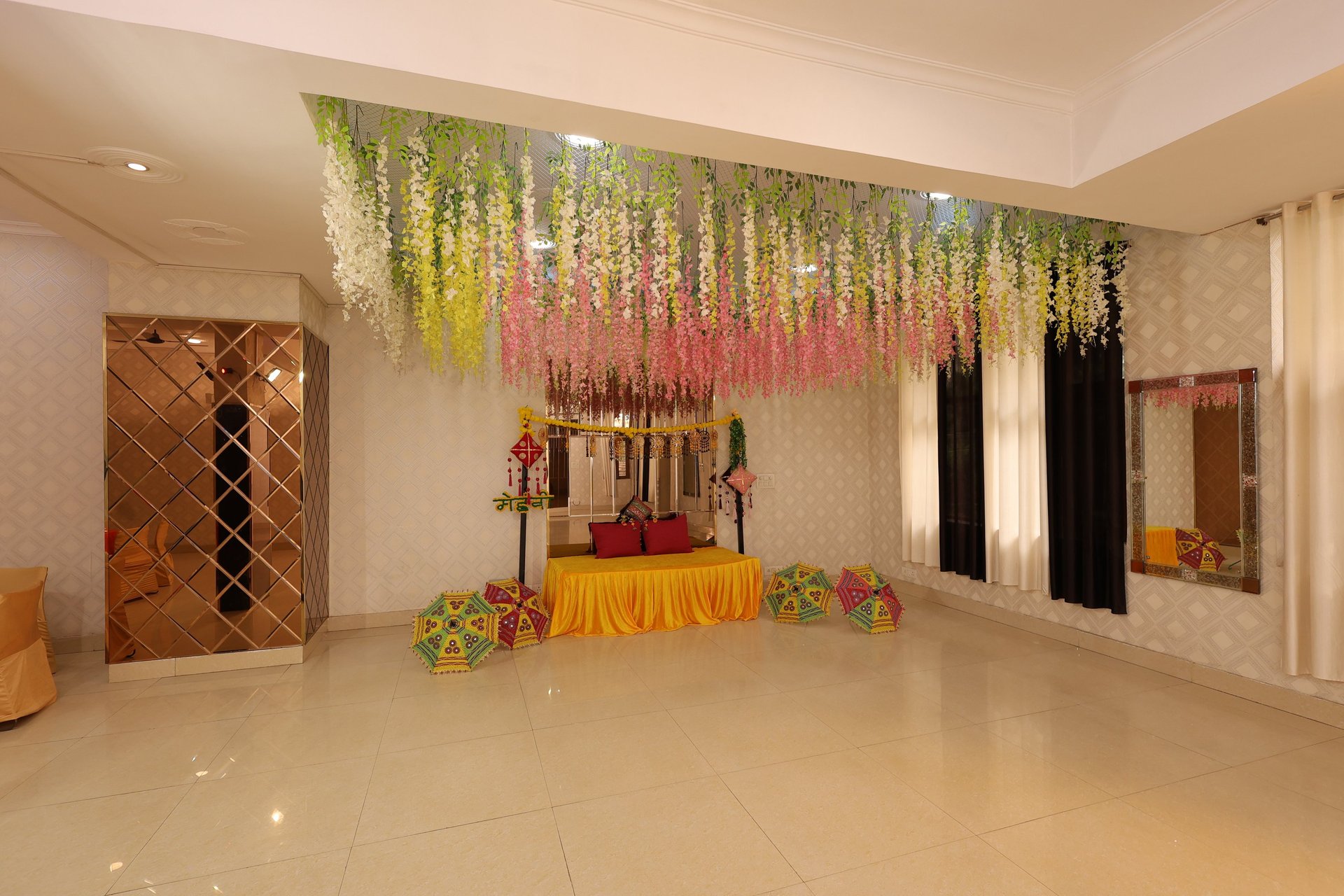 low-angle photo of Hotel lighted signage on top of brown building during nighttime