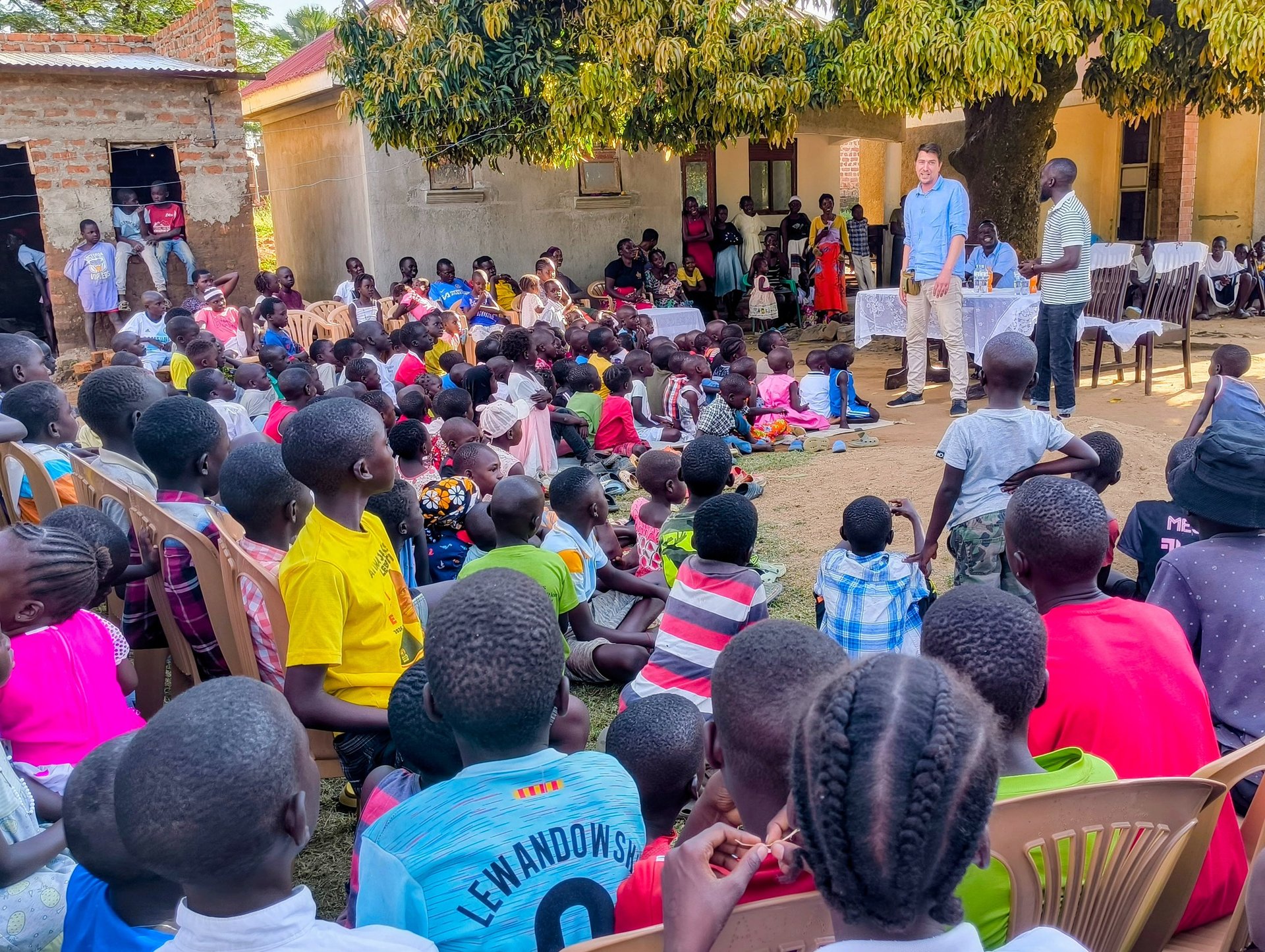 an abstract photo of a curved building with a blue sky in the background