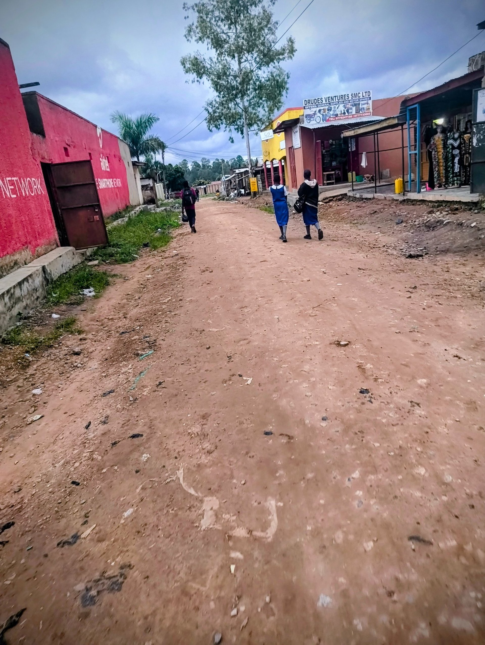 an abstract photo of a curved building with a blue sky in the background
