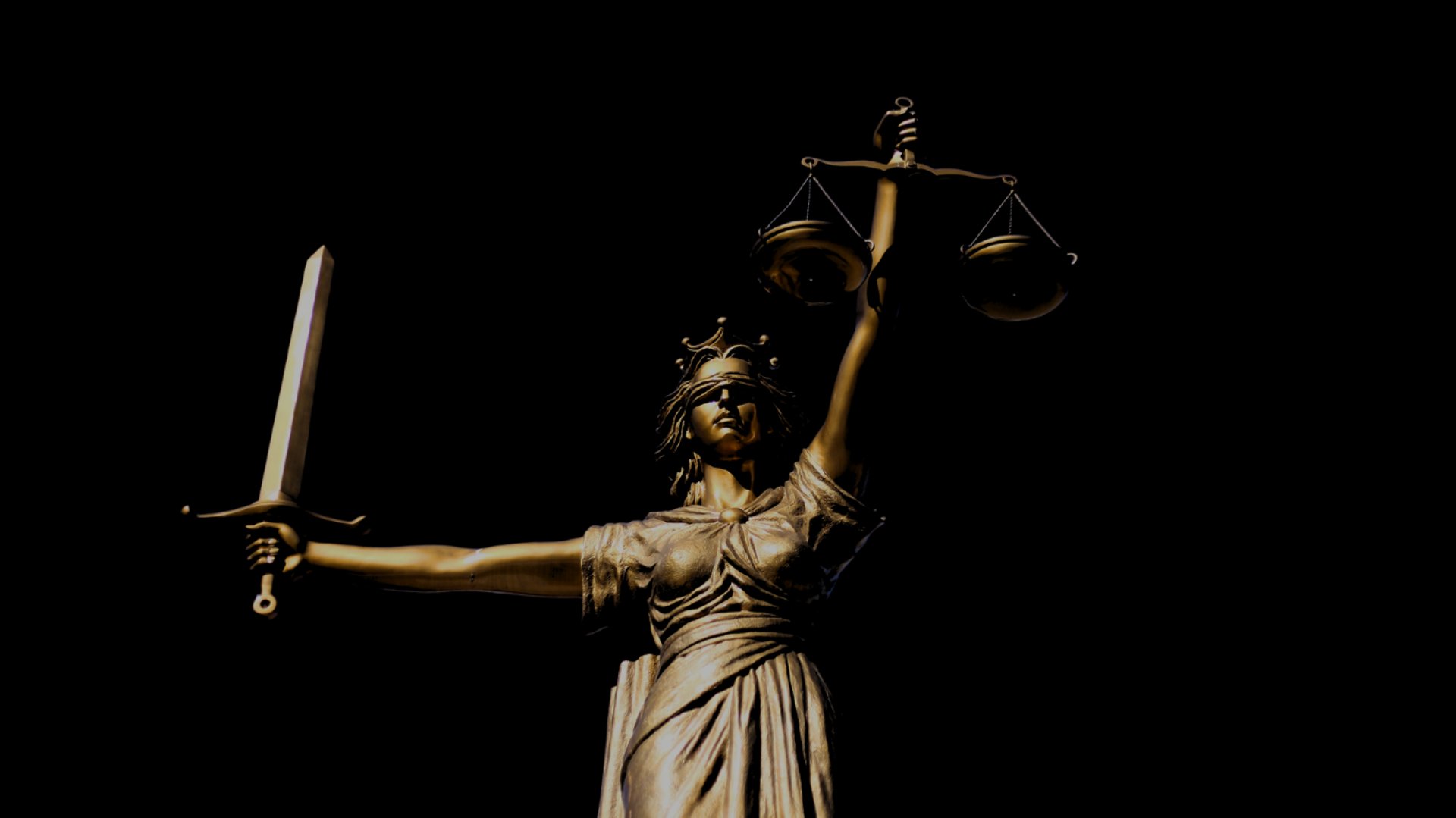 an abstract photo of a curved building with a blue sky in the background