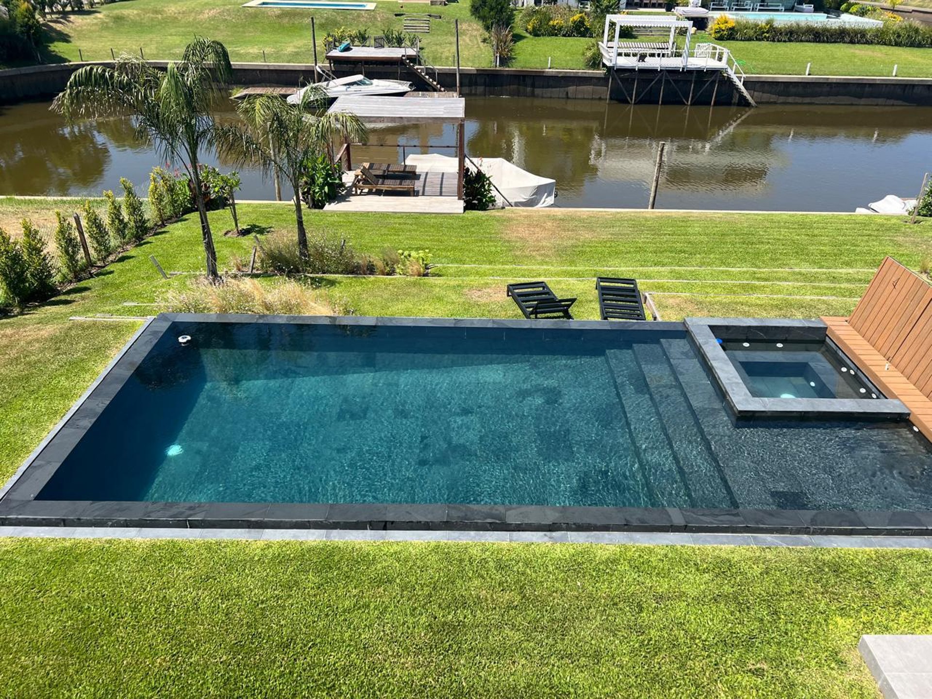 water fountain in the middle of the pool