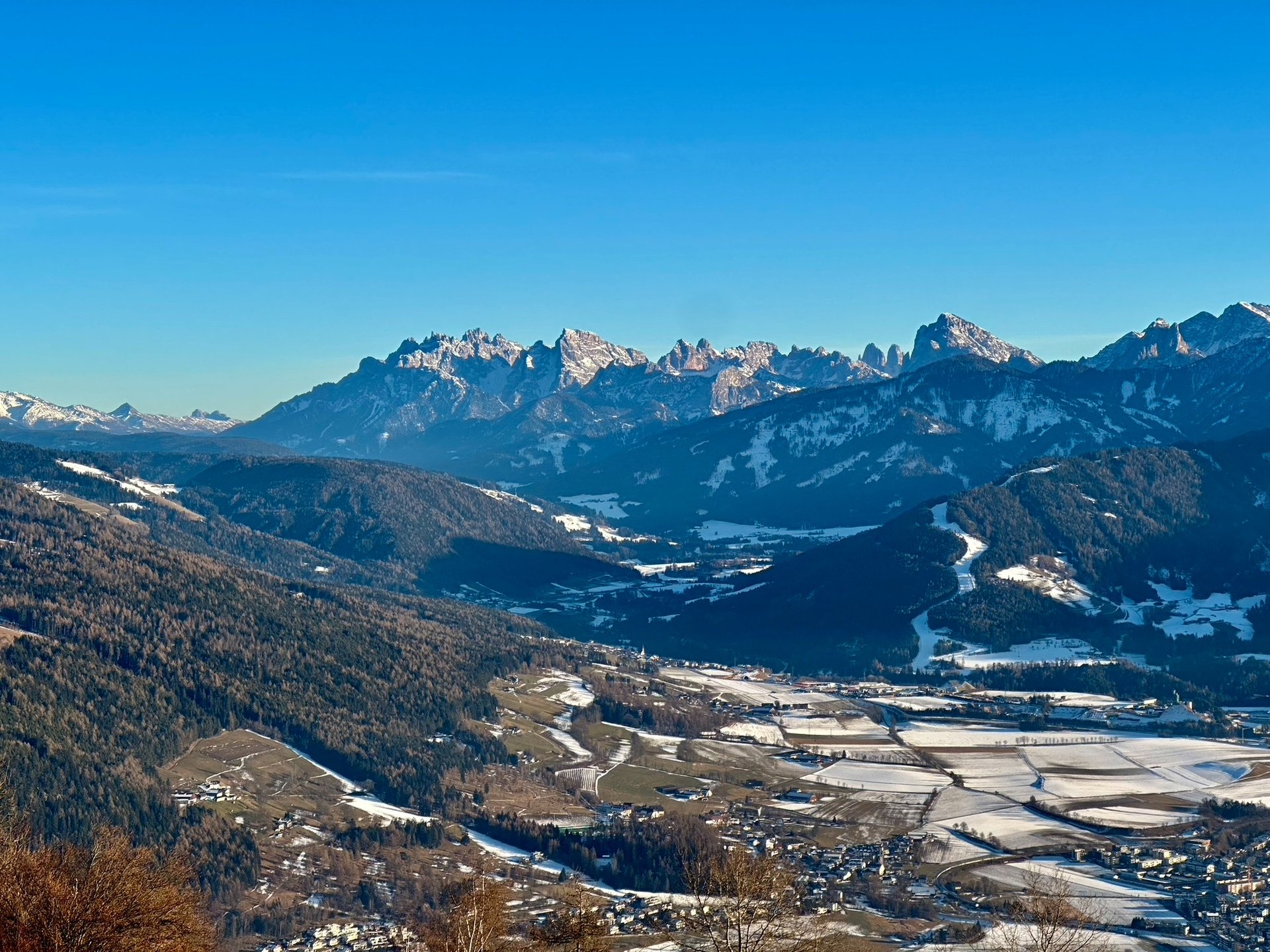 A black and white photo of mountains in the distance