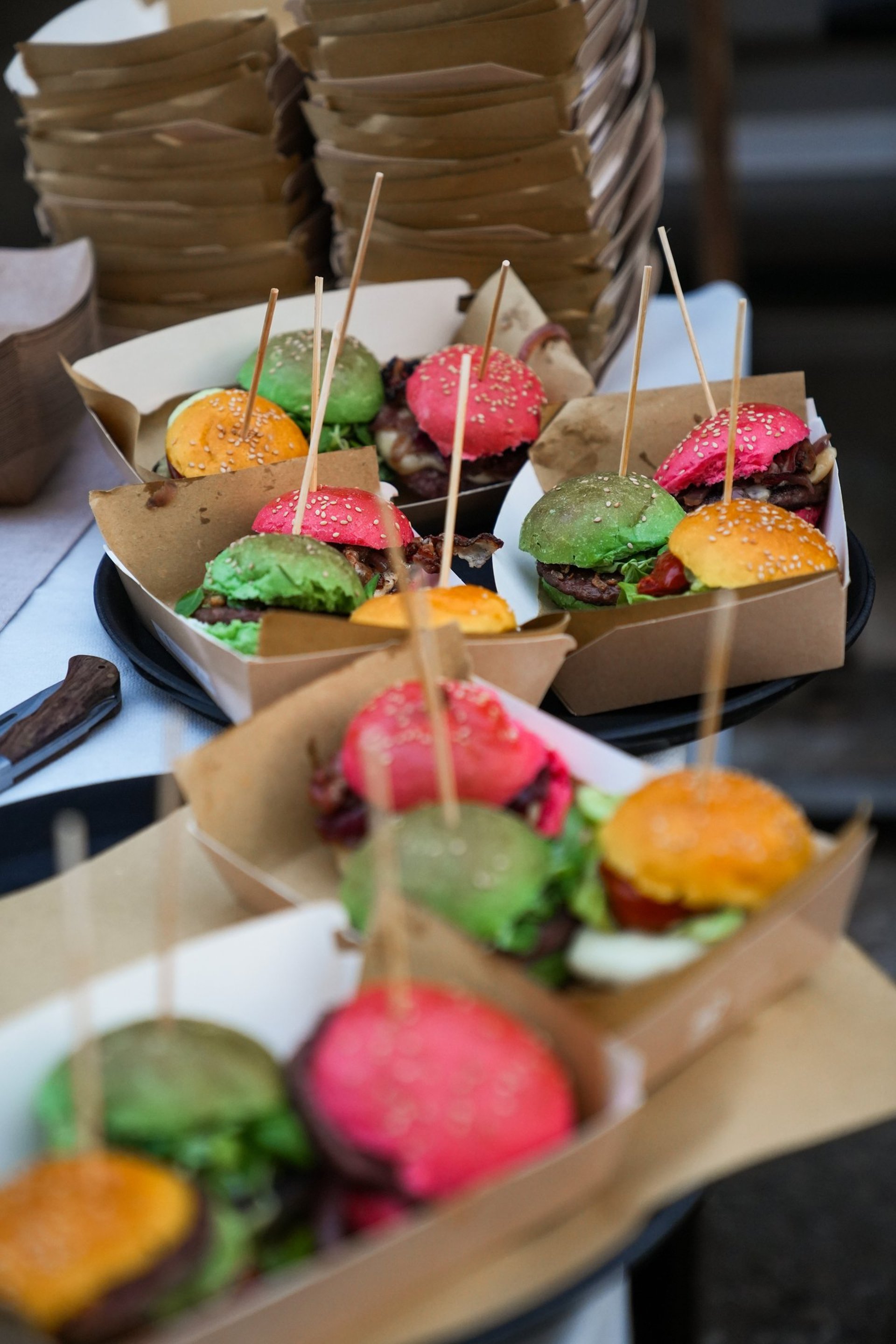 person sheeting dough