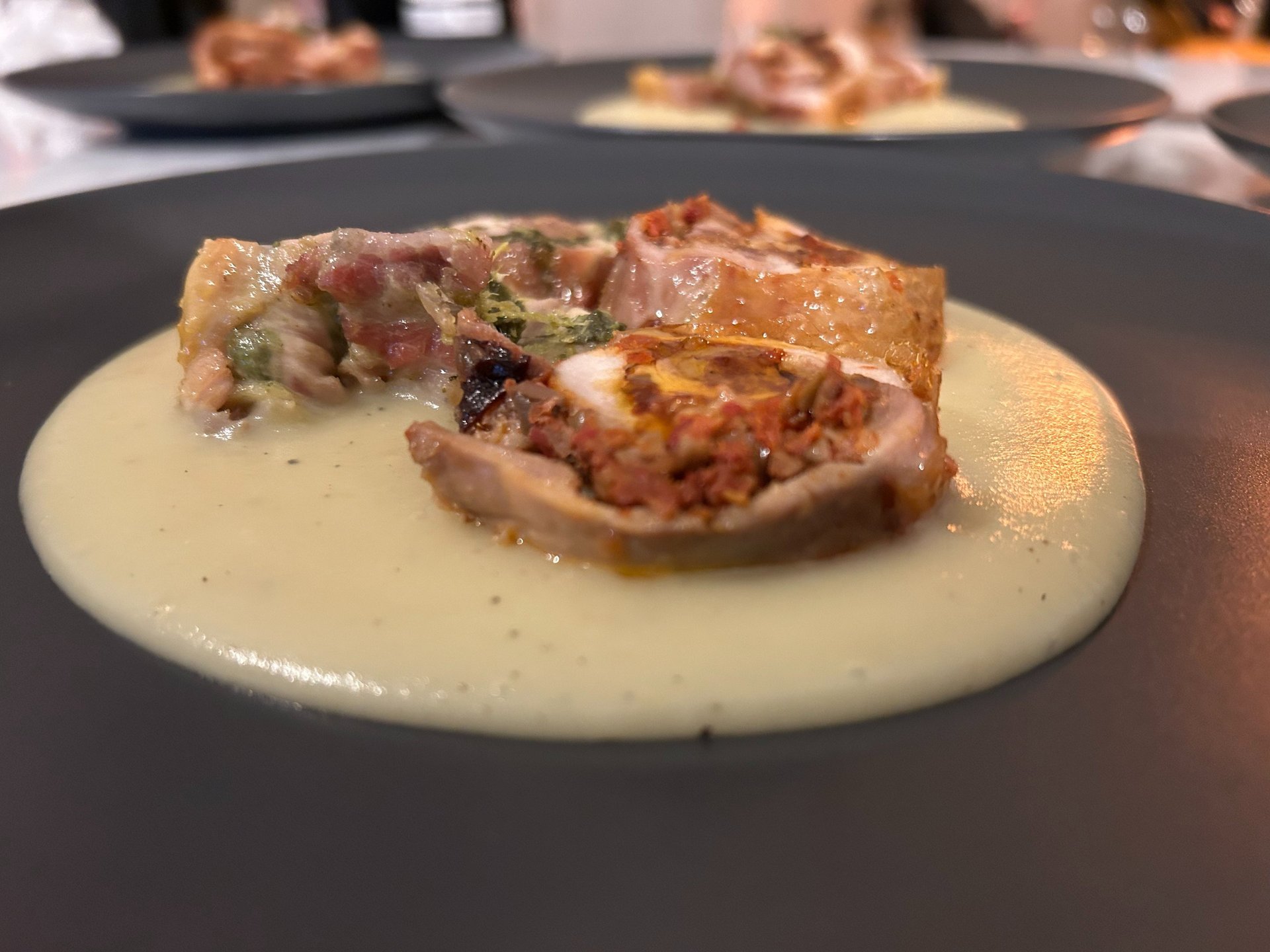 person sheeting dough