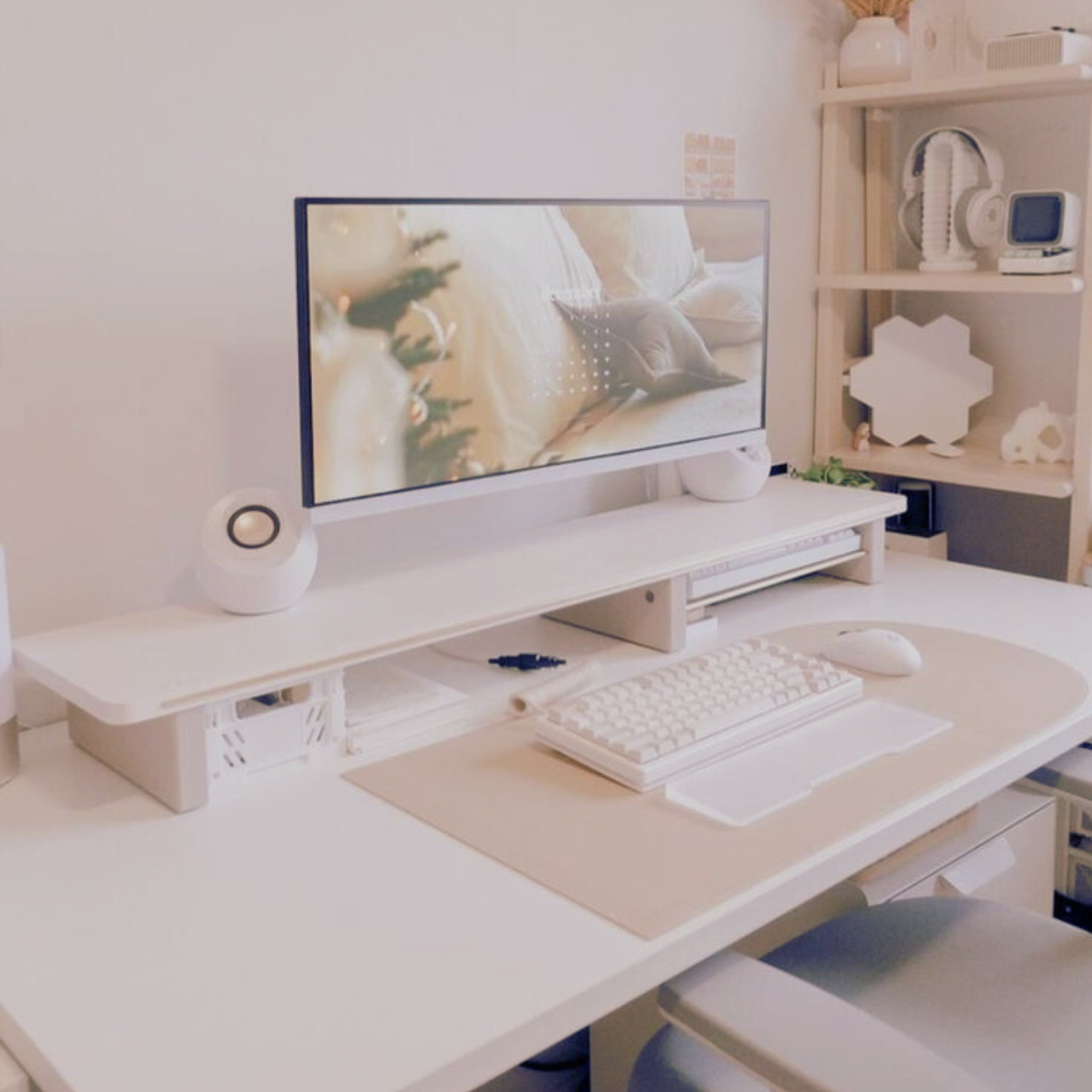 woman sitting on blanket located on shoreline
