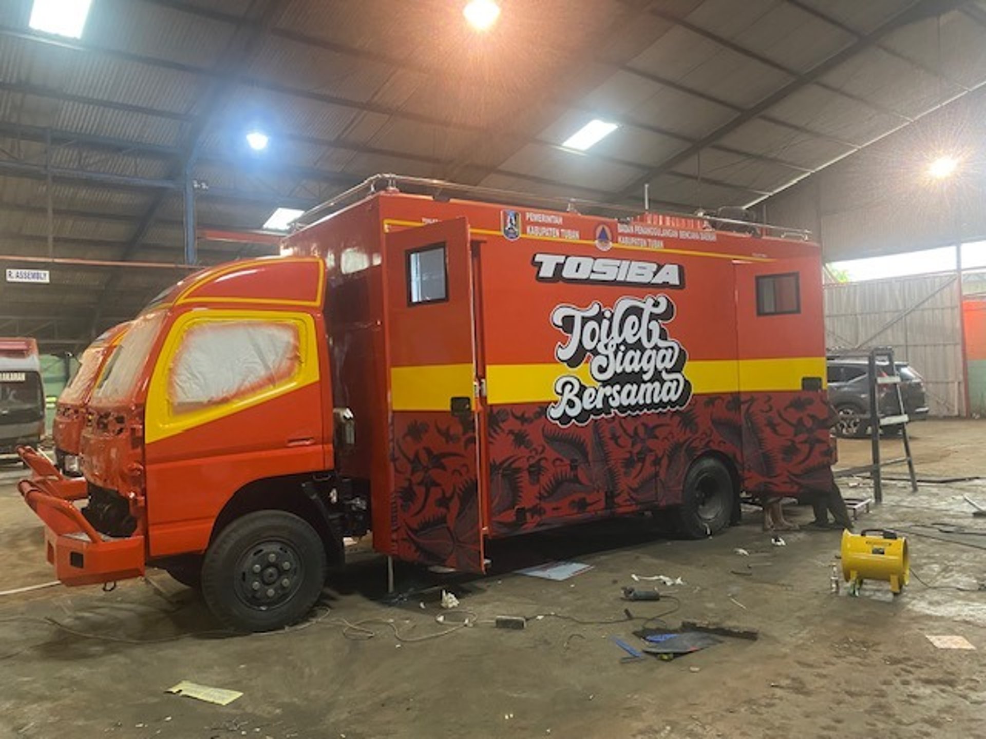 woman wearing yellow long-sleeved dress under white clouds and blue sky during daytime
