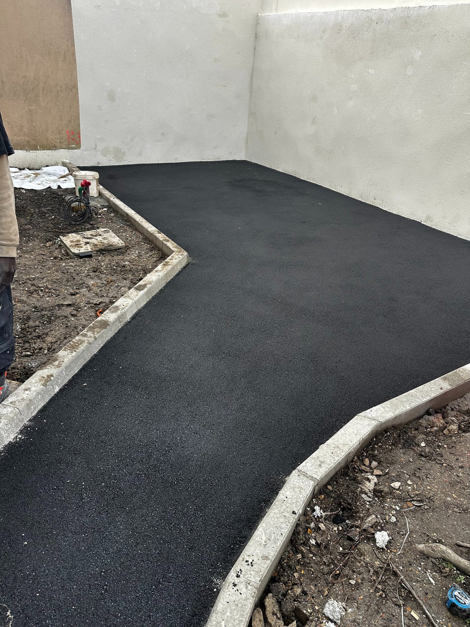 woman wearing yellow long-sleeved dress under white clouds and blue sky during daytime