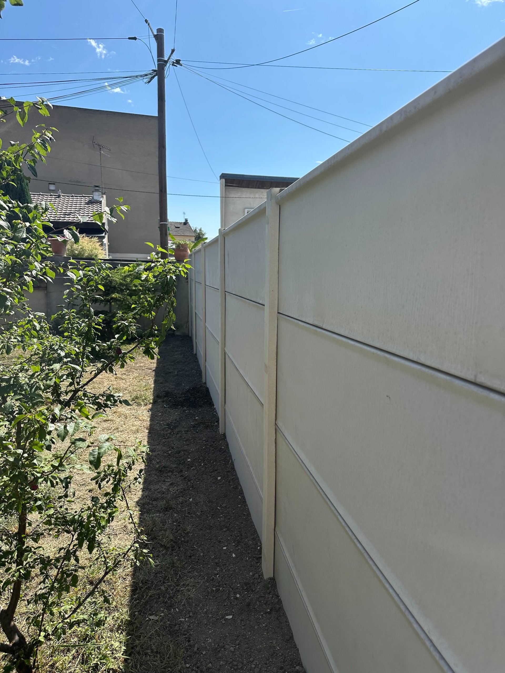 woman wearing yellow long-sleeved dress under white clouds and blue sky during daytime