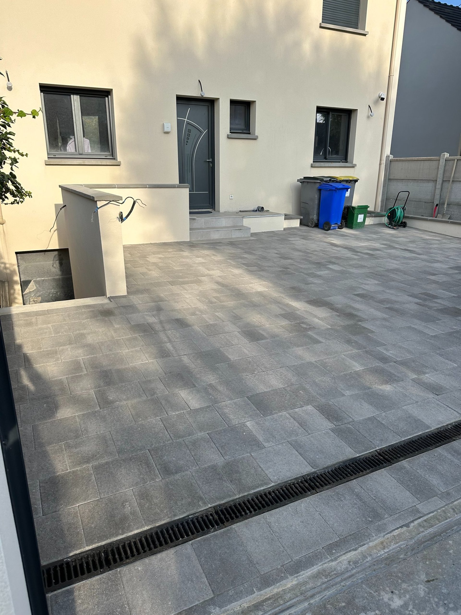 five yellow hard hats on gray surface