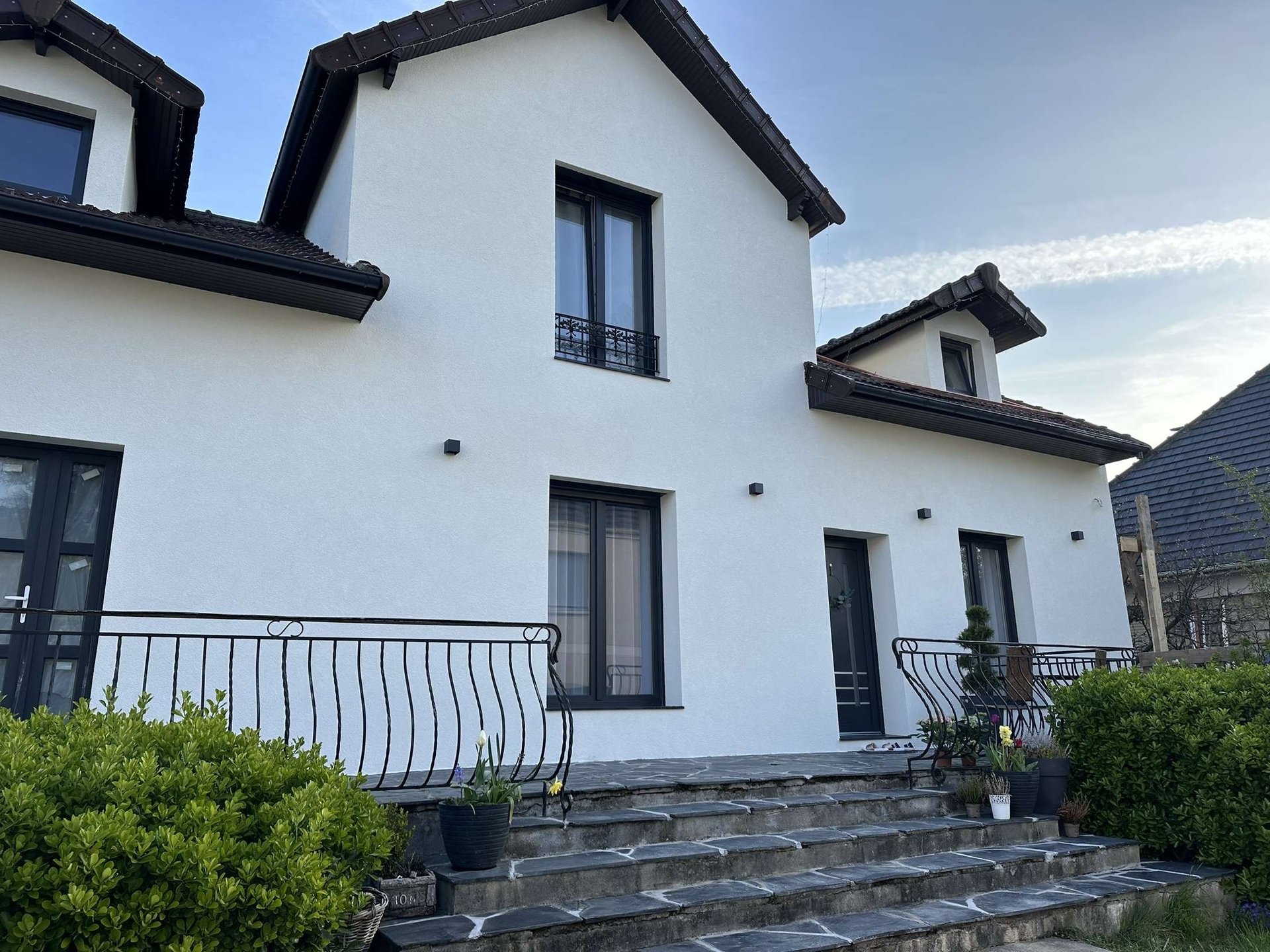 black and brown leather padded tub sofa