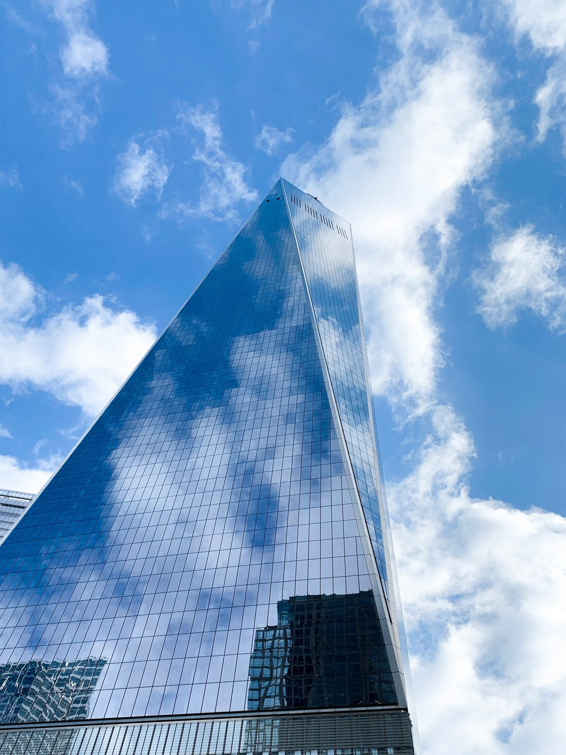 A very tall building with a sky background