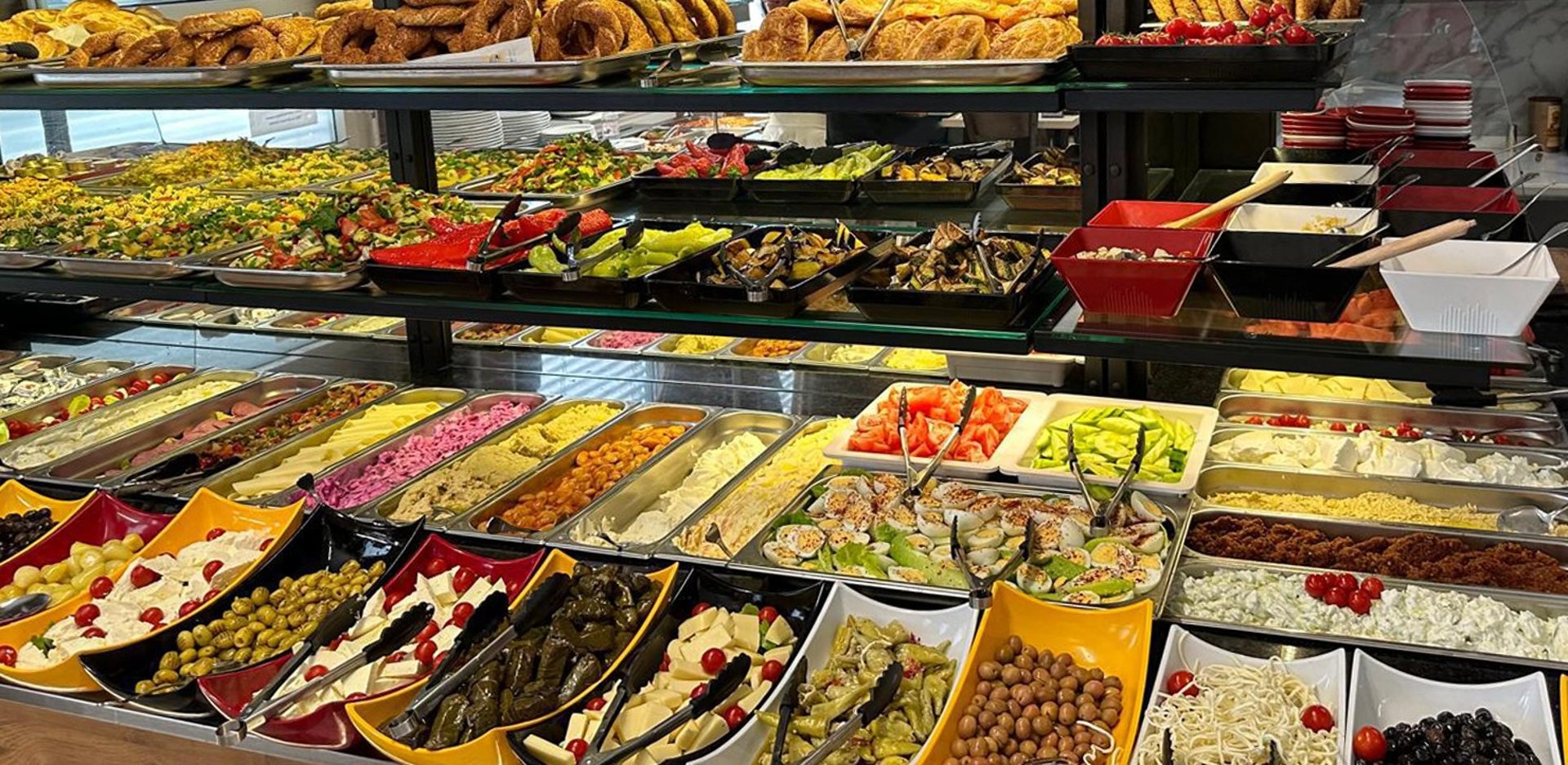 woman wearing yellow long-sleeved dress under white clouds and blue sky during daytime