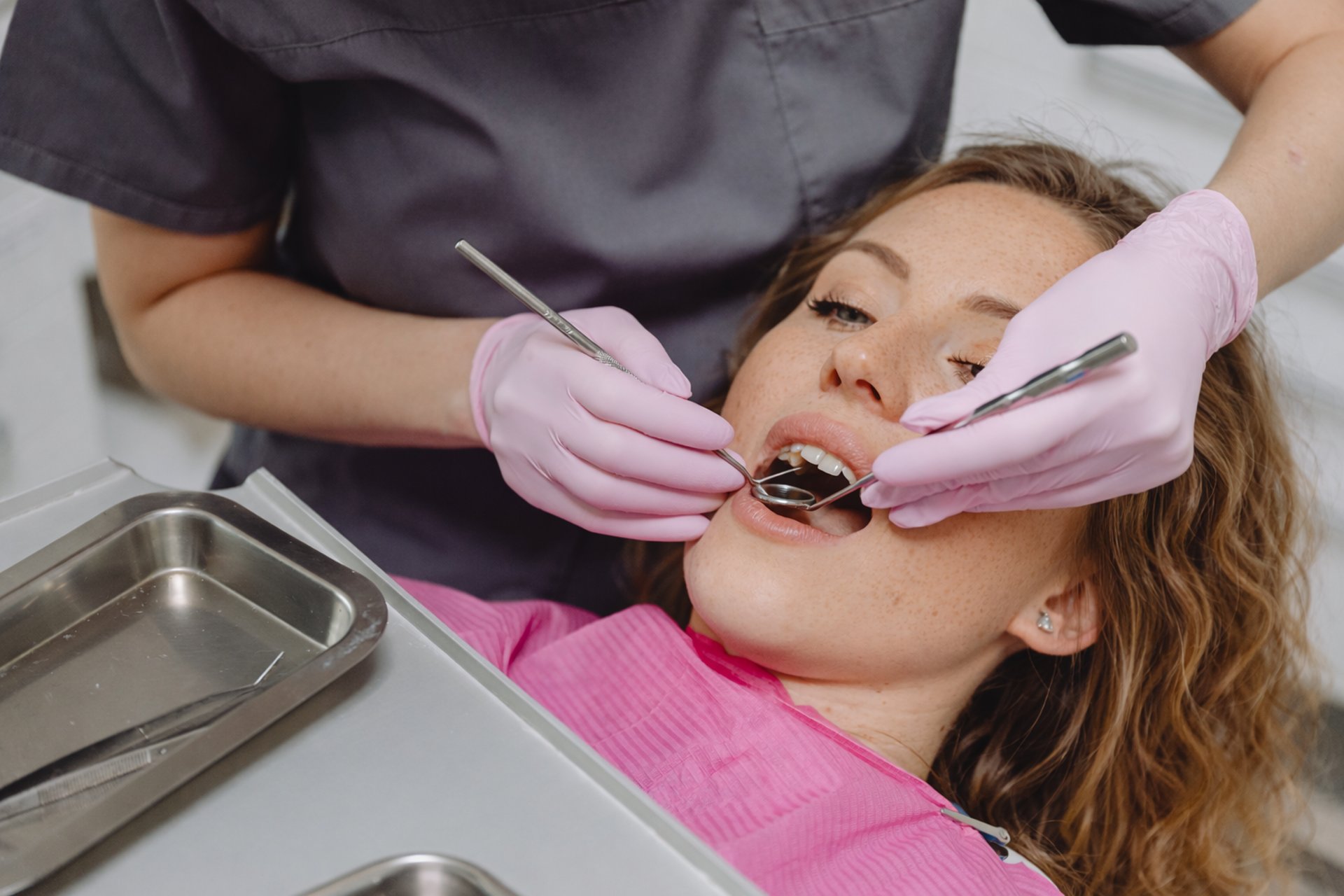 an abstract photo of a curved building with a blue sky in the background