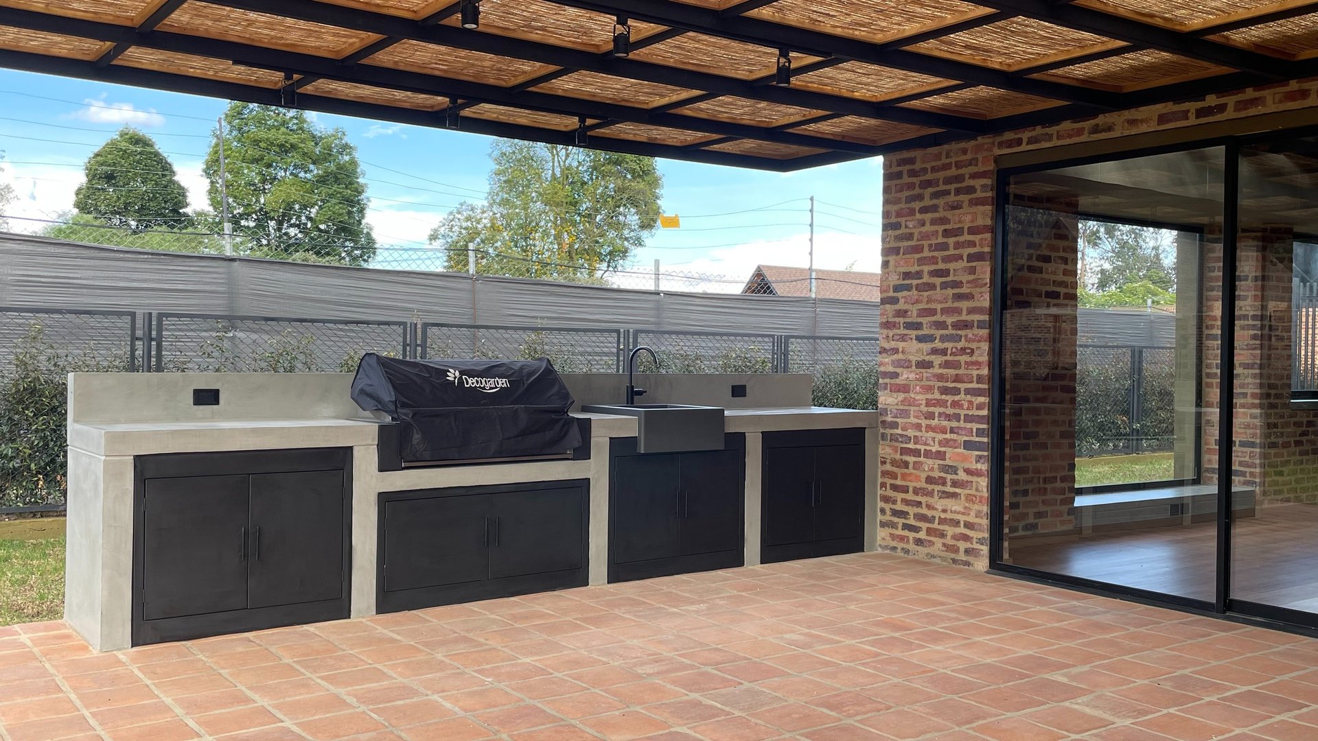 an abstract photo of a curved building with a blue sky in the background