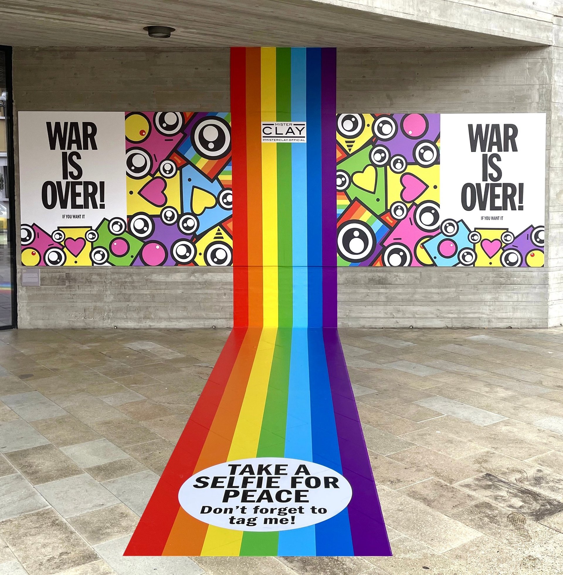 an abstract photo of a curved building with a blue sky in the background