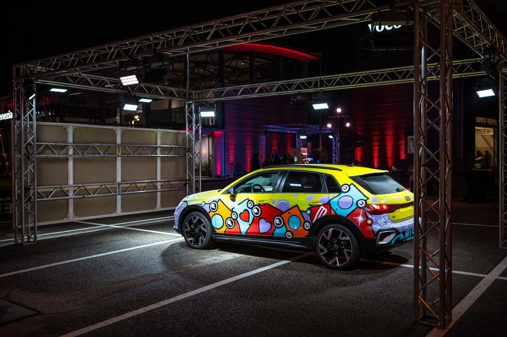 an abstract photo of a curved building with a blue sky in the background