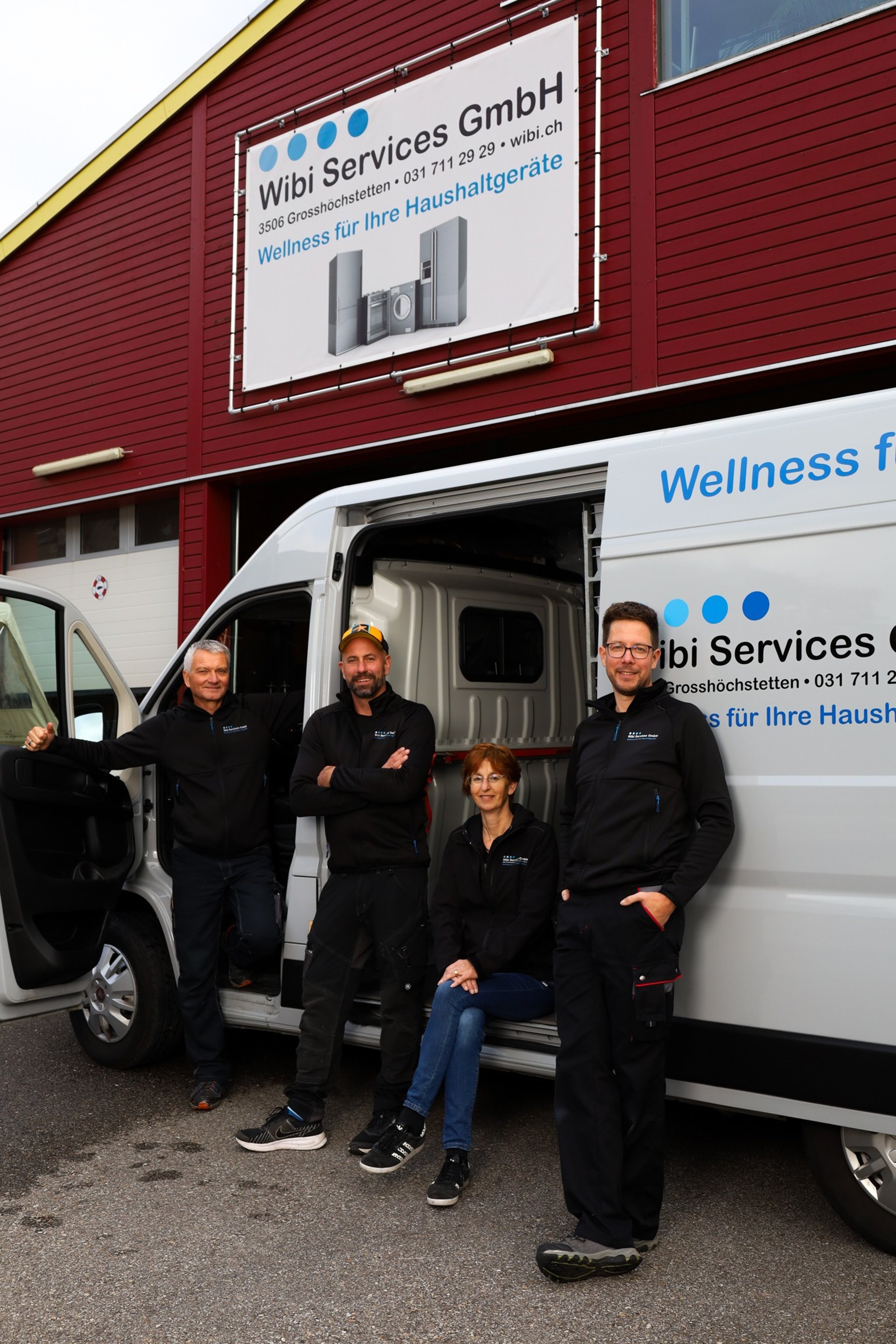 an abstract photo of a curved building with a blue sky in the background