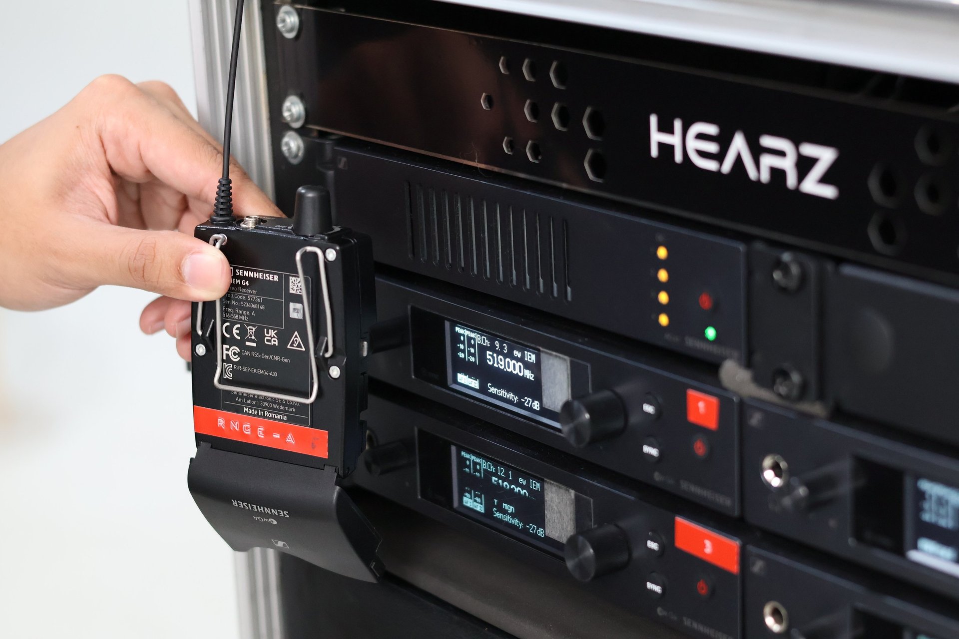man in white crew neck t-shirt wearing blue cap and black sunglasses