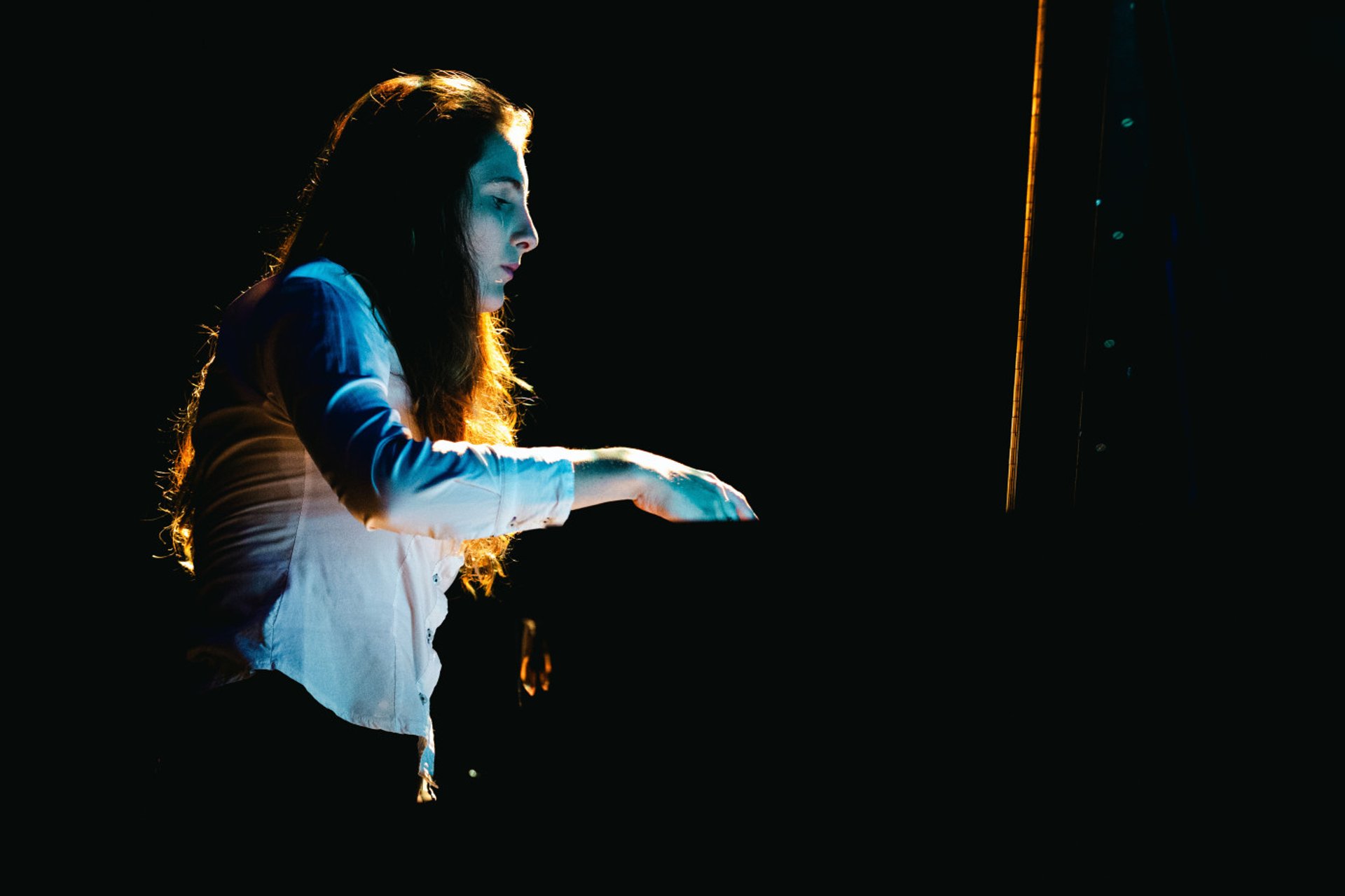 a close up of a black and brown abstract painting