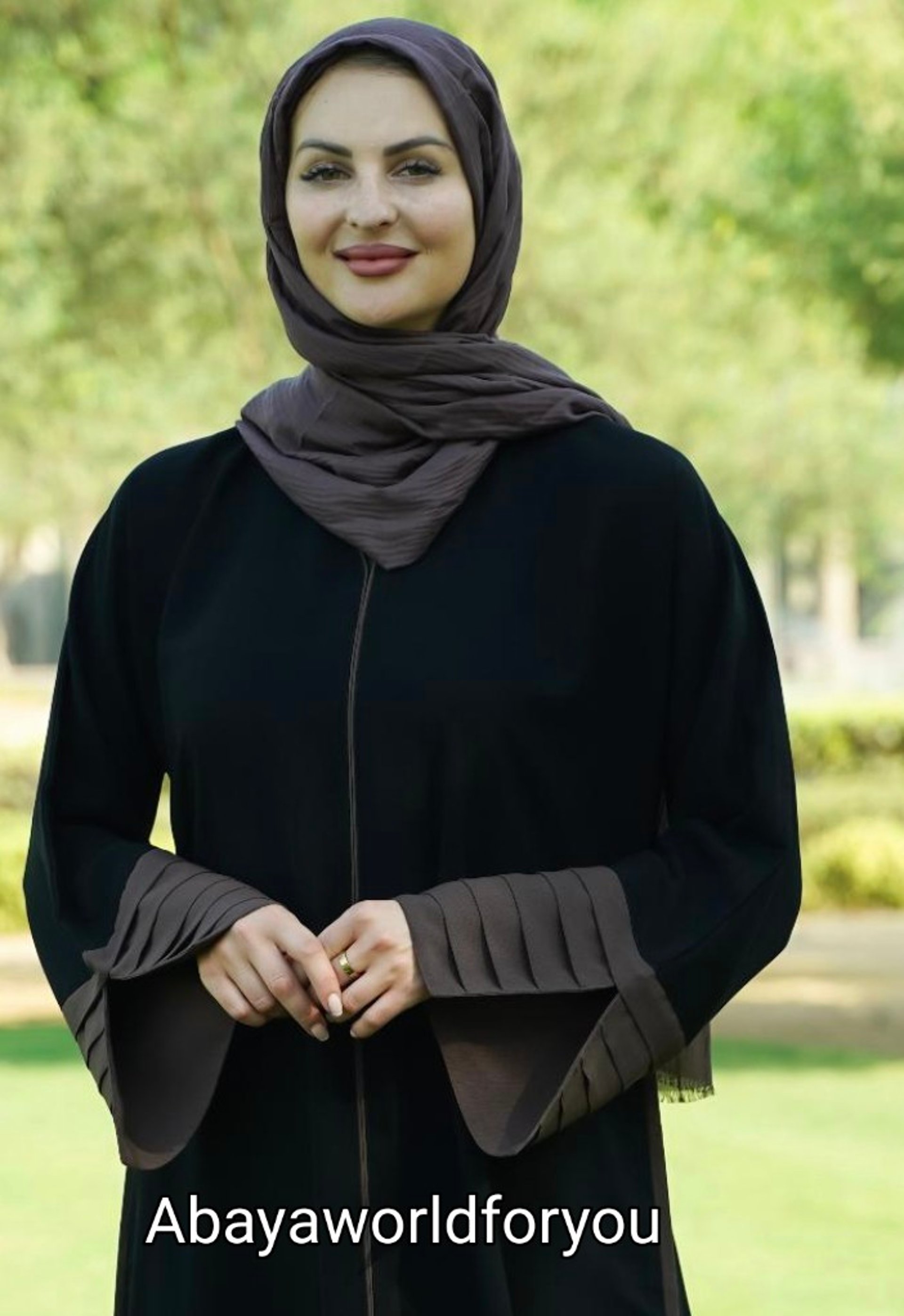 woman wearing yellow long-sleeved dress under white clouds and blue sky during daytime