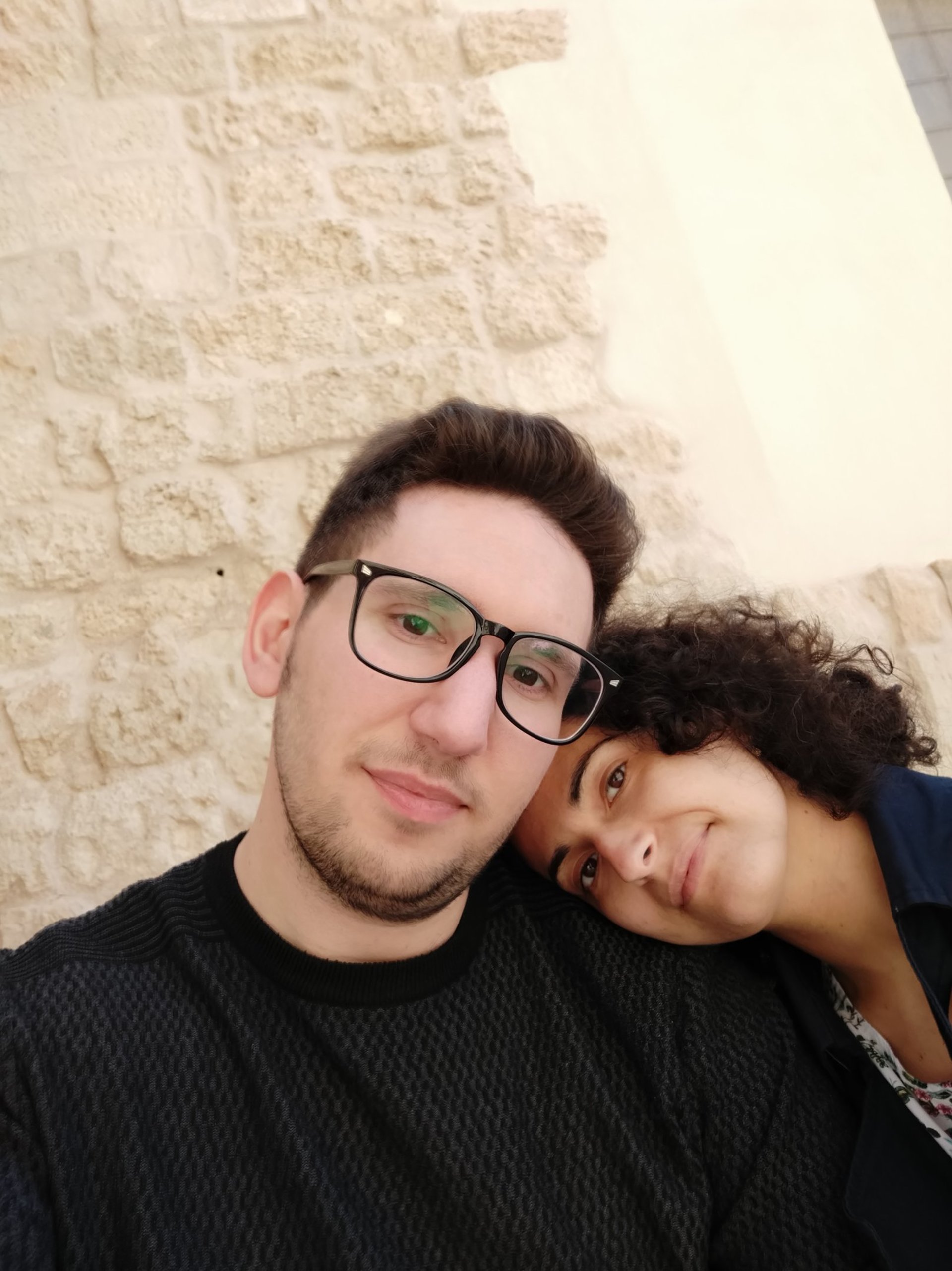 couple wearing silver-colored rings