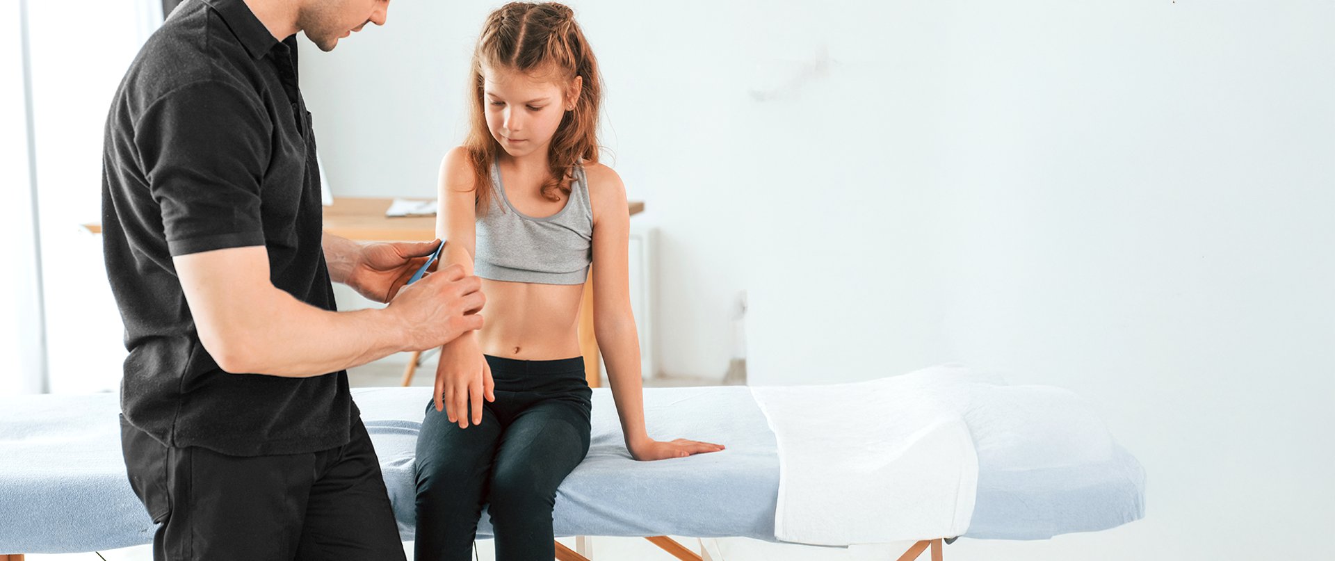 an abstract photo of a curved building with a blue sky in the background