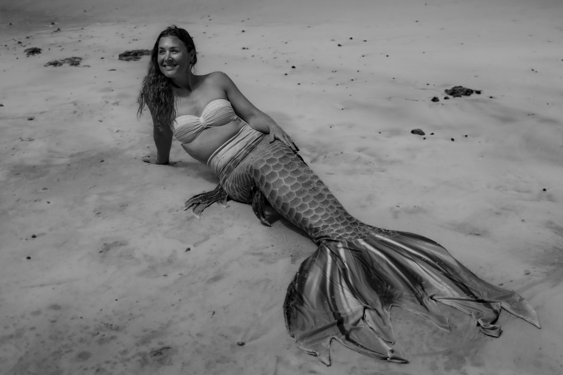 woman swimming under body of water