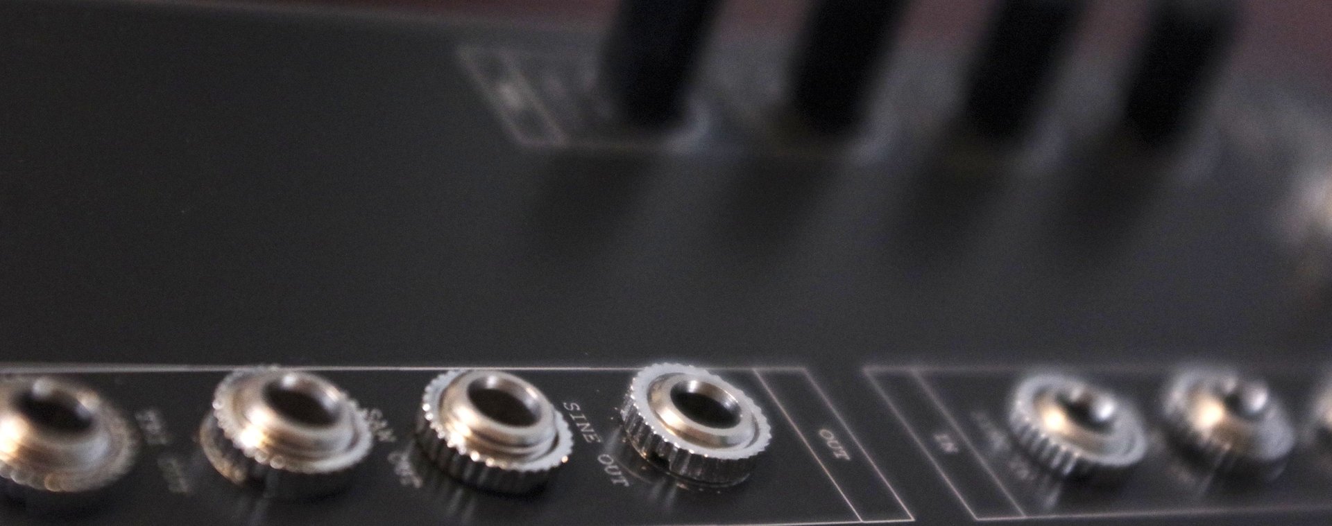 green light streaks on black background