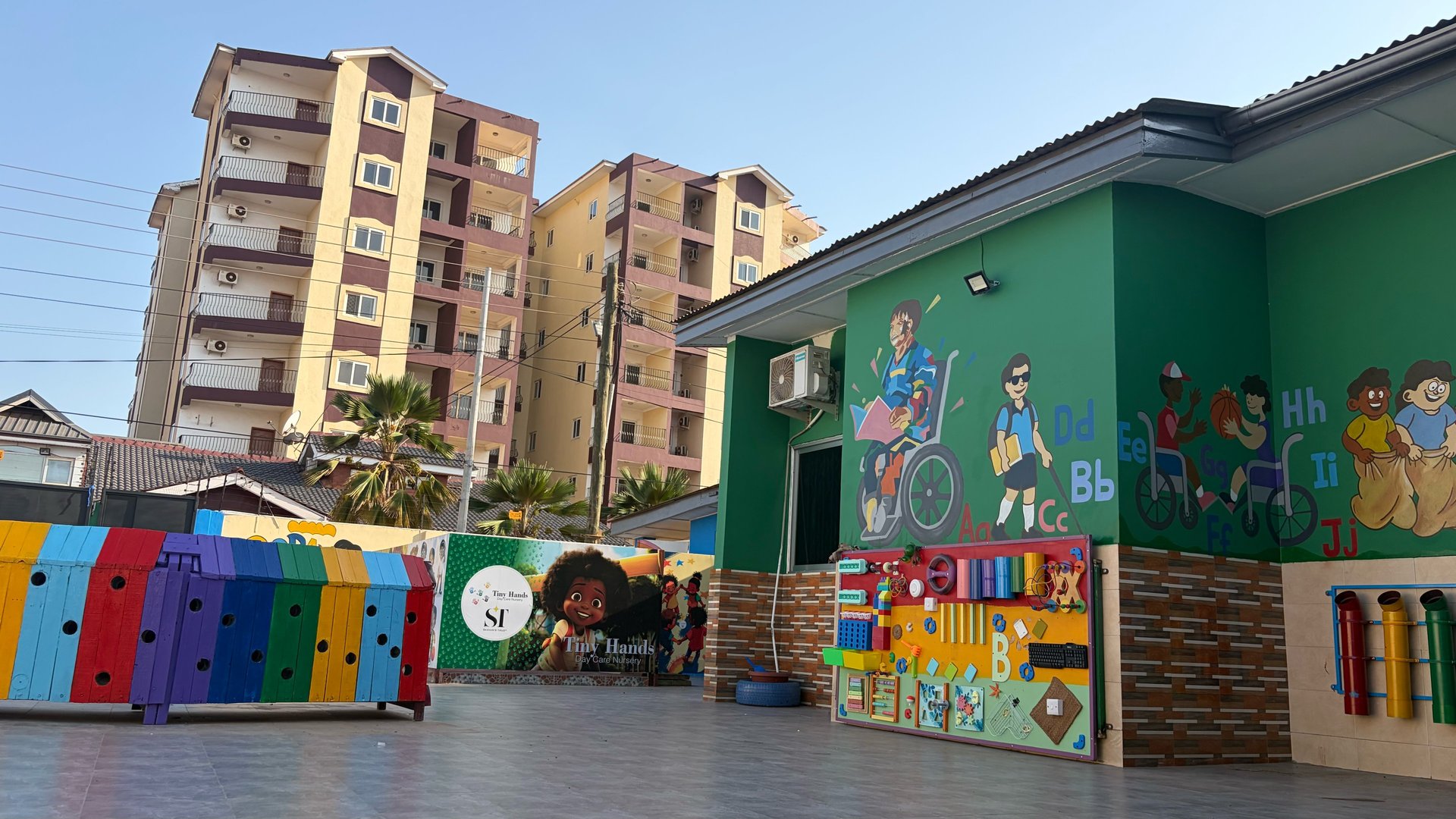 woman wearing yellow long-sleeved dress under white clouds and blue sky during daytime