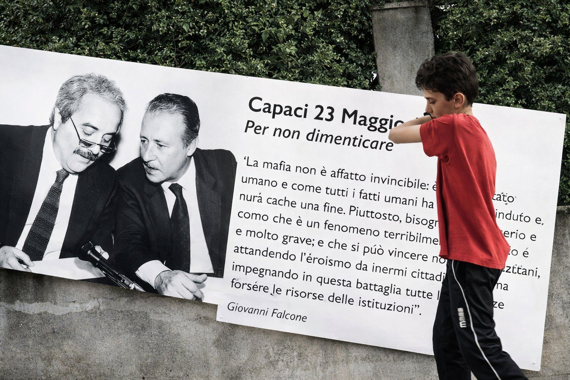 an abstract photo of a curved building with a blue sky in the background
