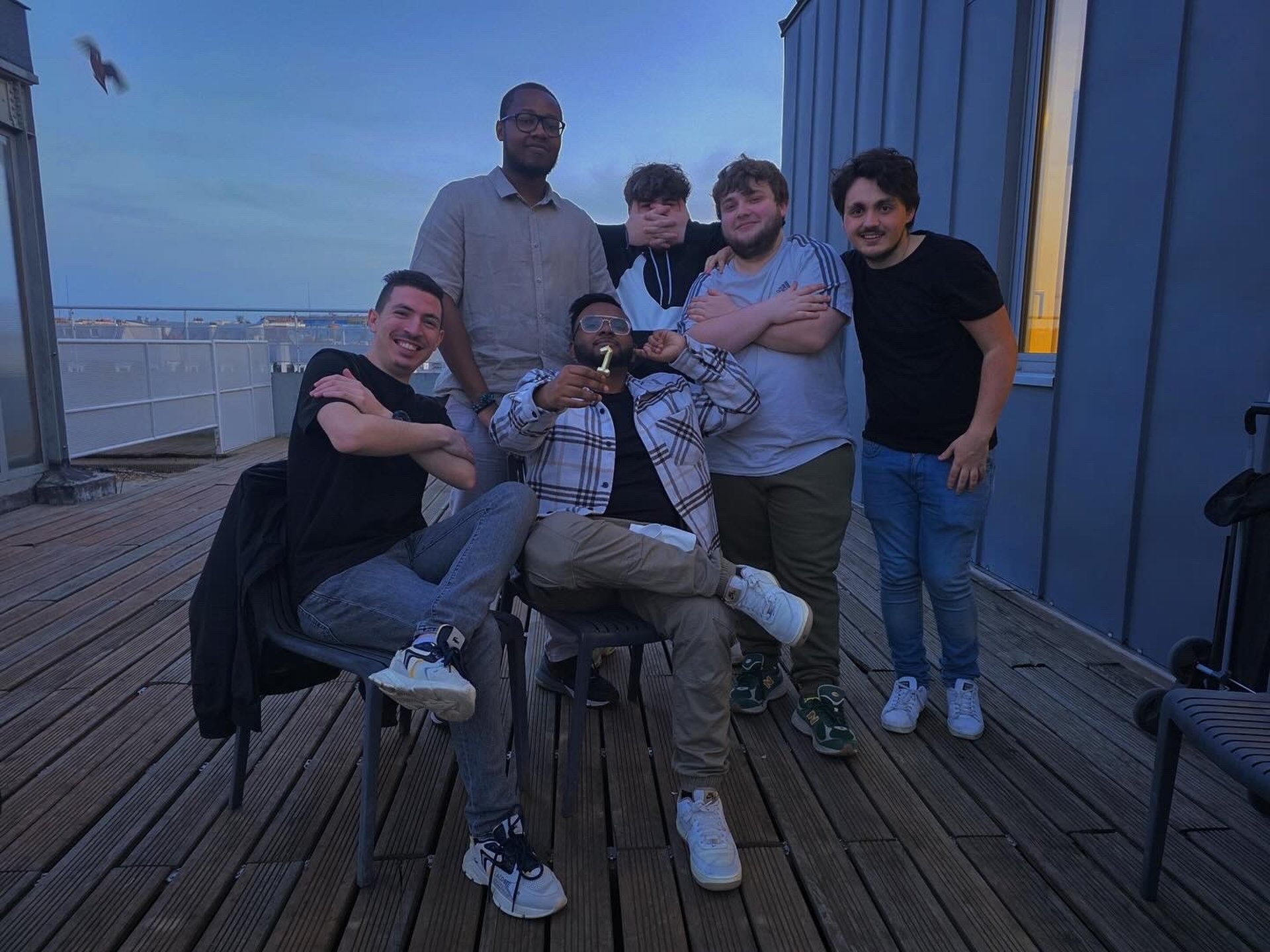 an abstract photo of a curved building with a blue sky in the background