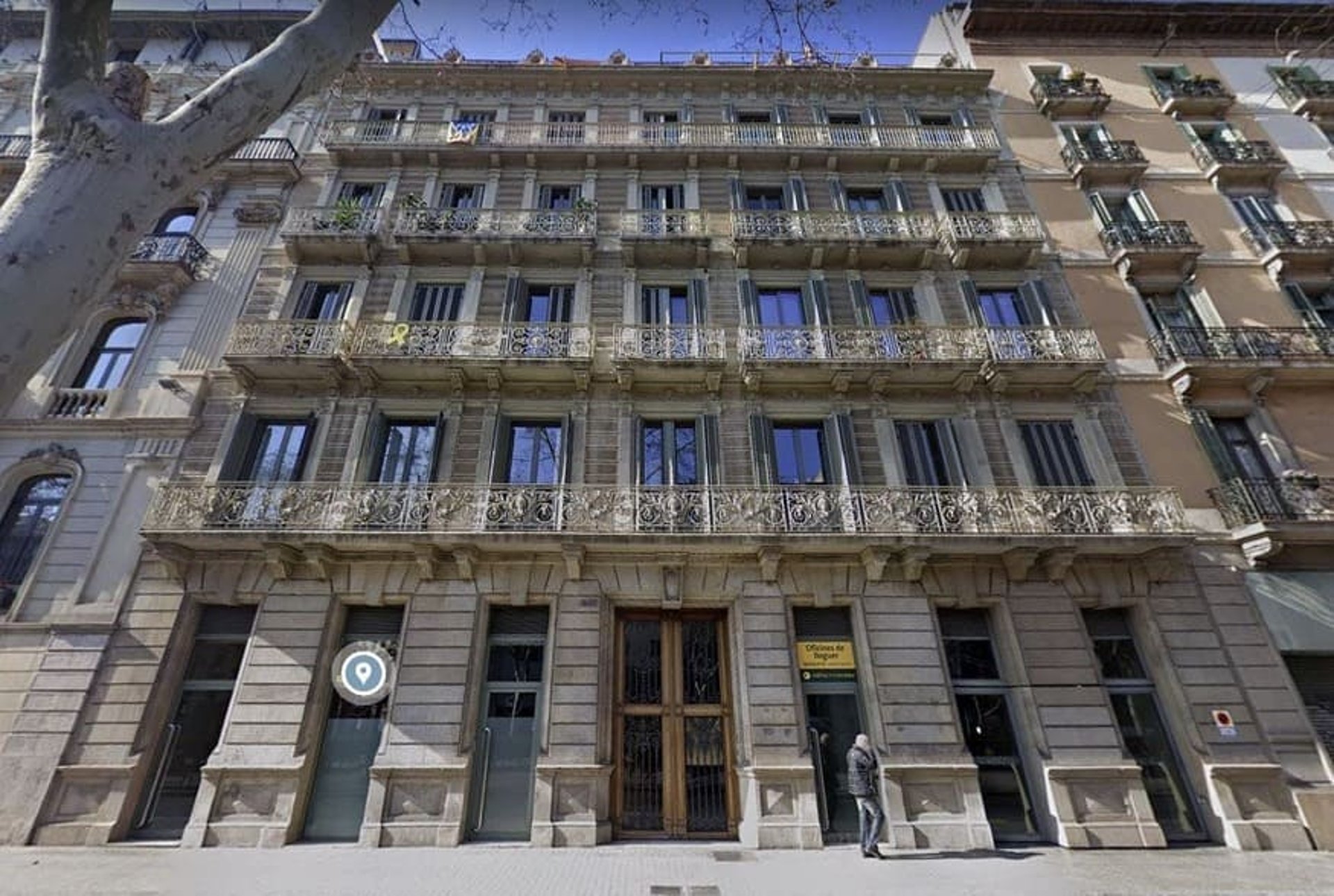 an aerial view of a city with lots of buildings