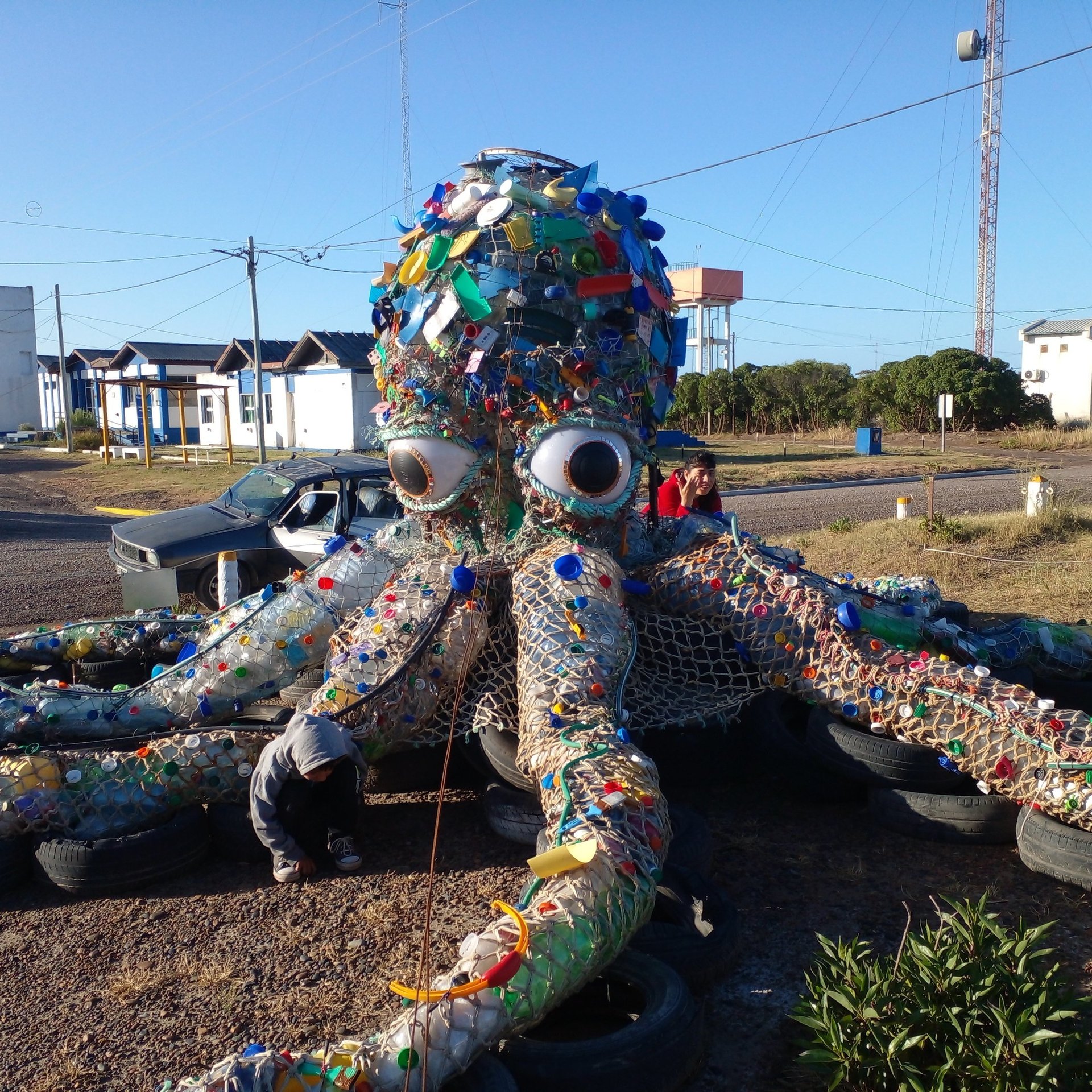 a close up of a black and brown abstract painting