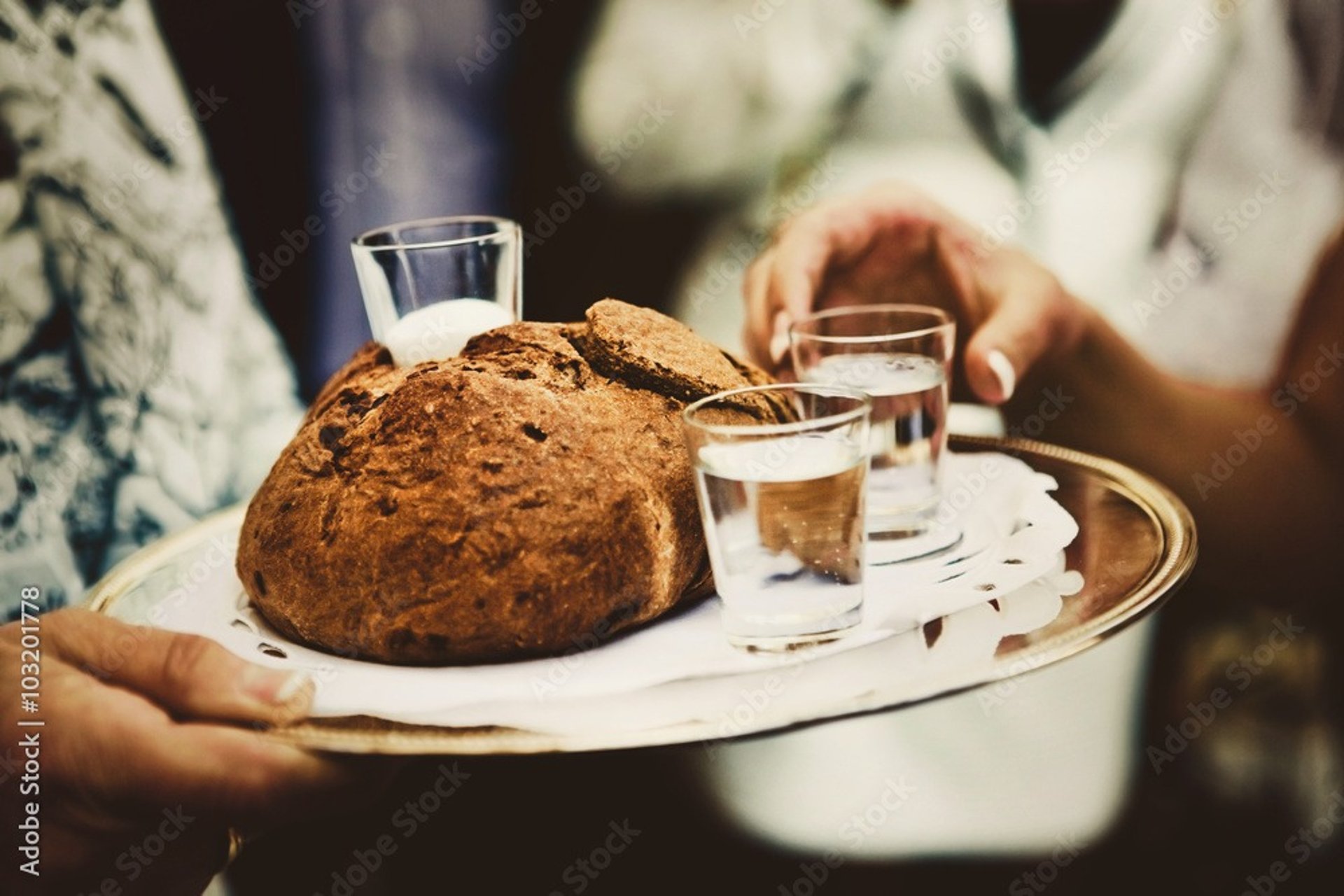 couple wearing silver-colored rings