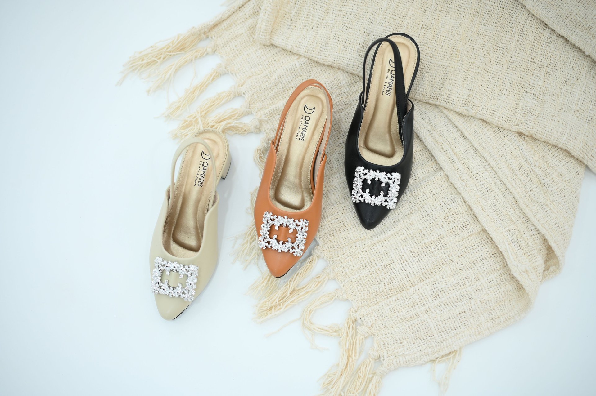 woman holding dried flower