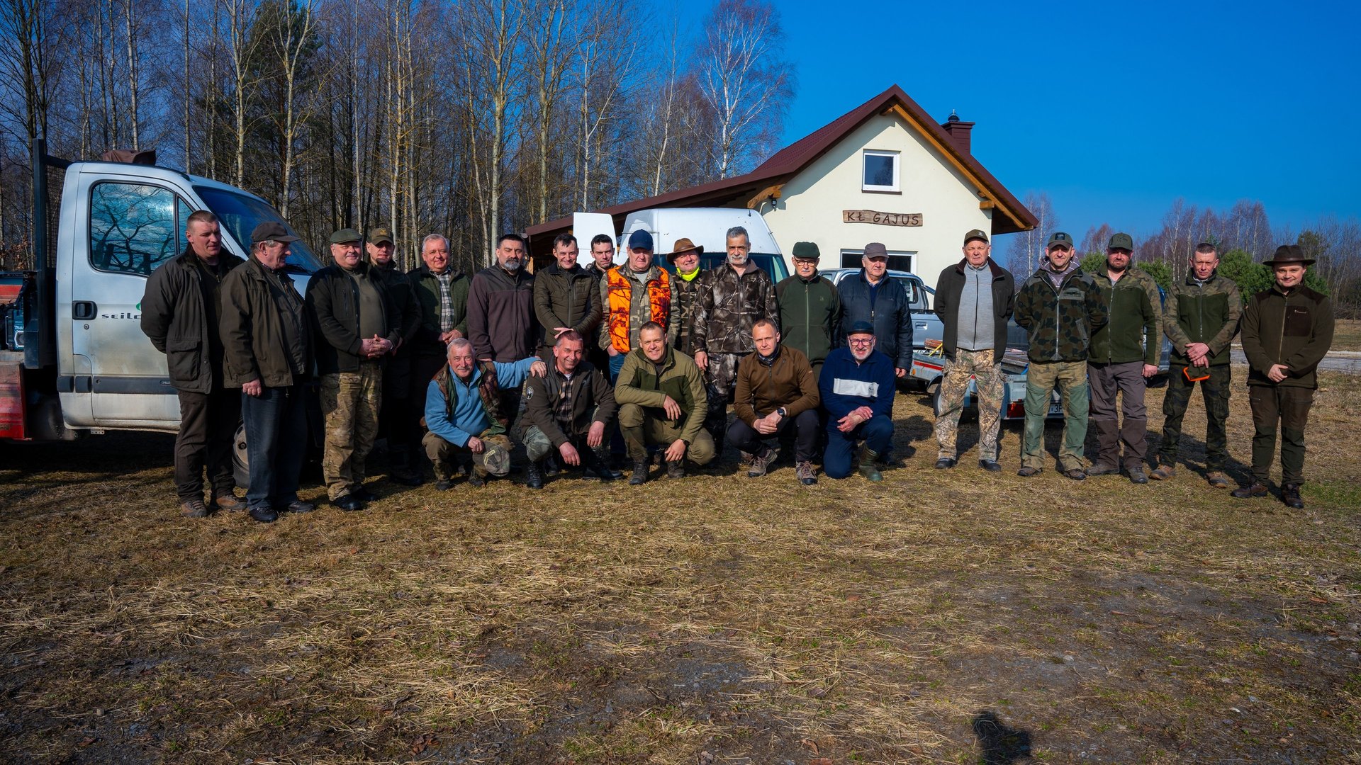 aerial shot of road surrounded by green trees