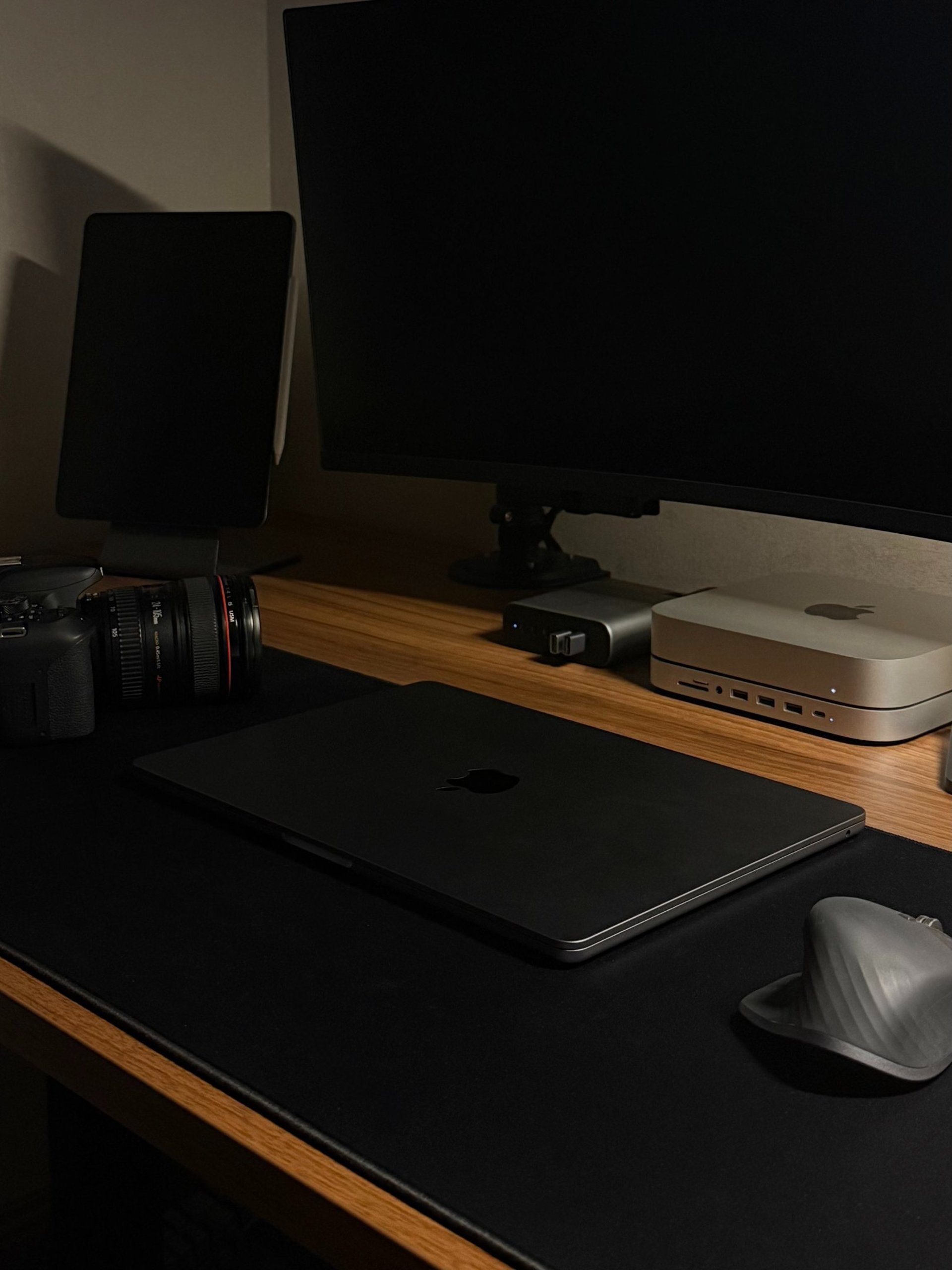 Apple MacBook beside computer mouse on table