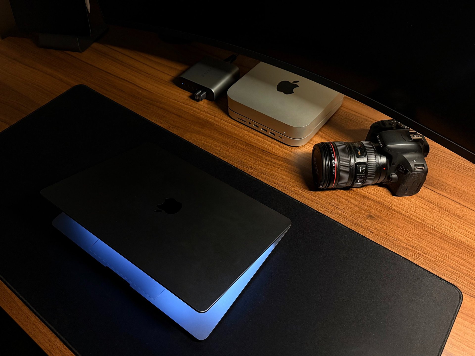 Apple MacBook beside computer mouse on table