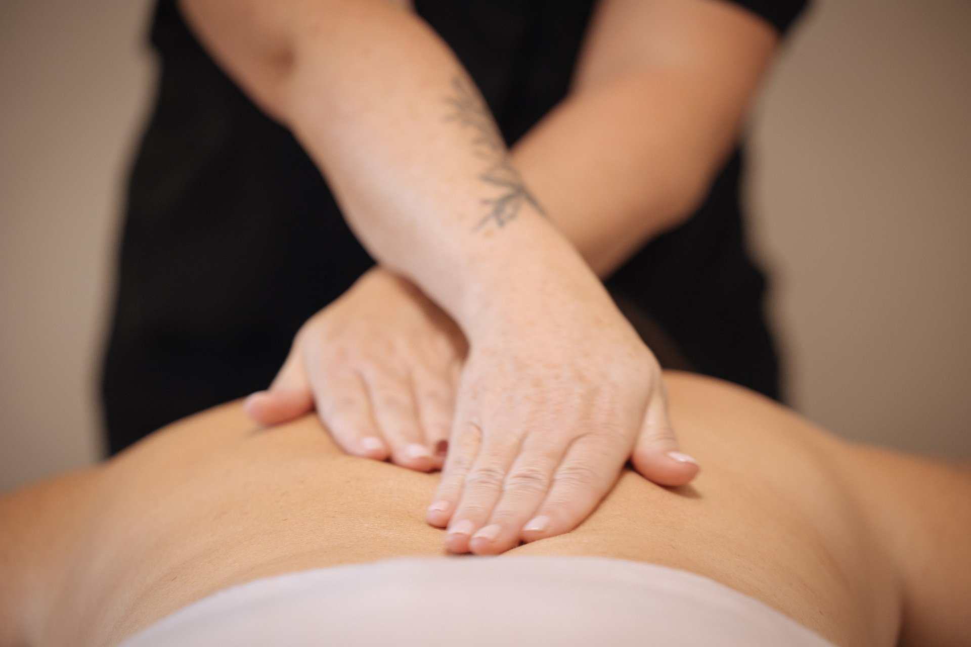 black and brown leather padded tub sofa