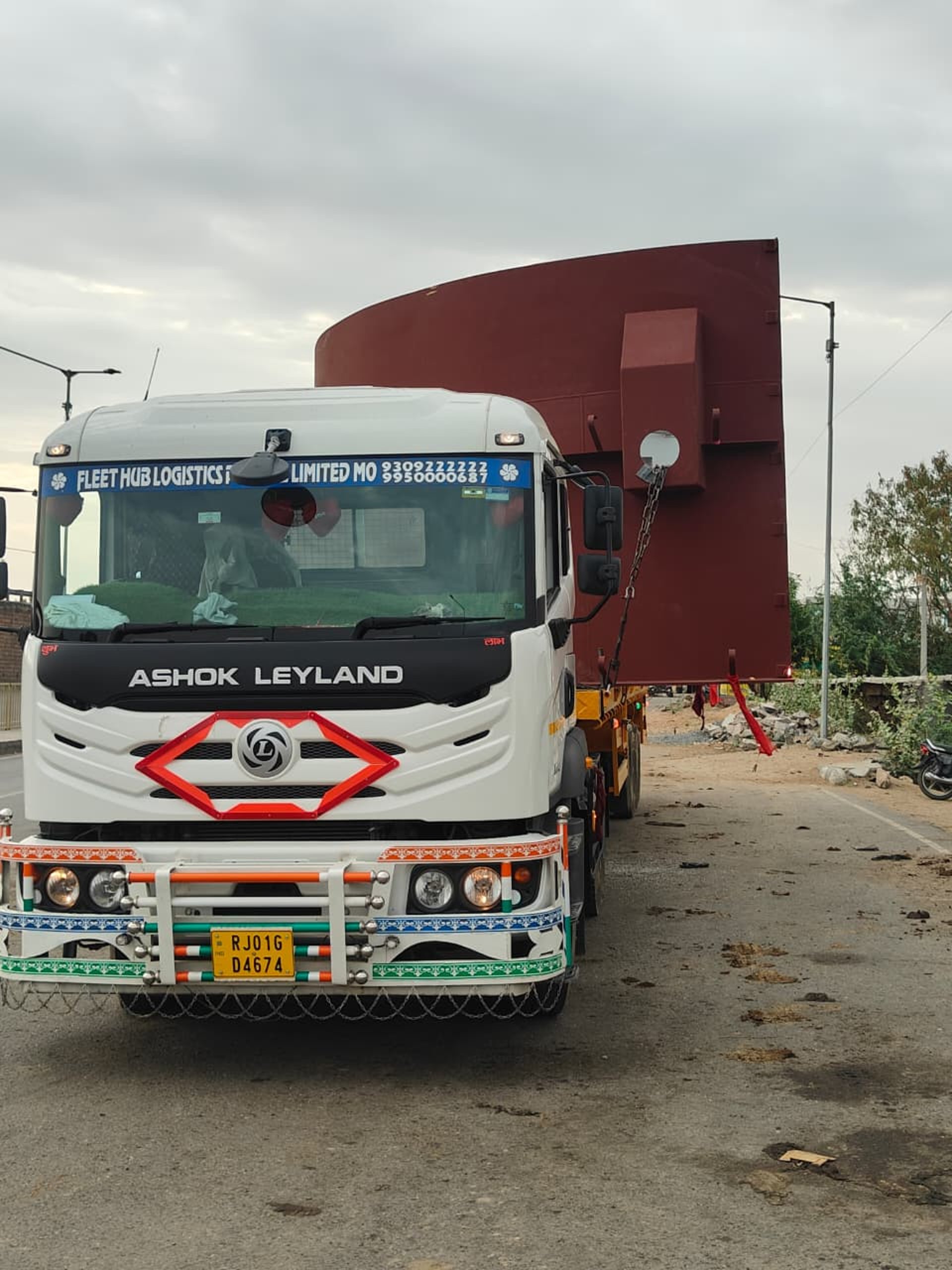 woman wearing yellow long-sleeved dress under white clouds and blue sky during daytime