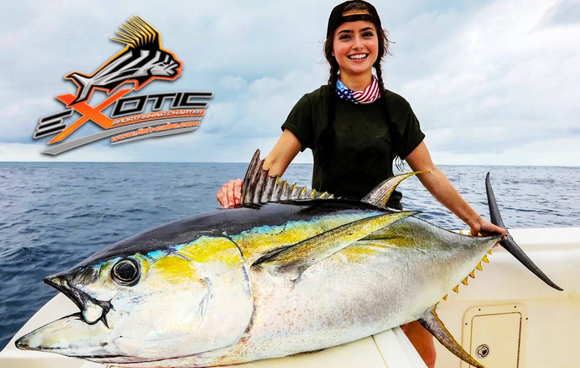 A pretty young woman who caught a big yellowfin tuna on Gordo Banks off San Jose del Cabo