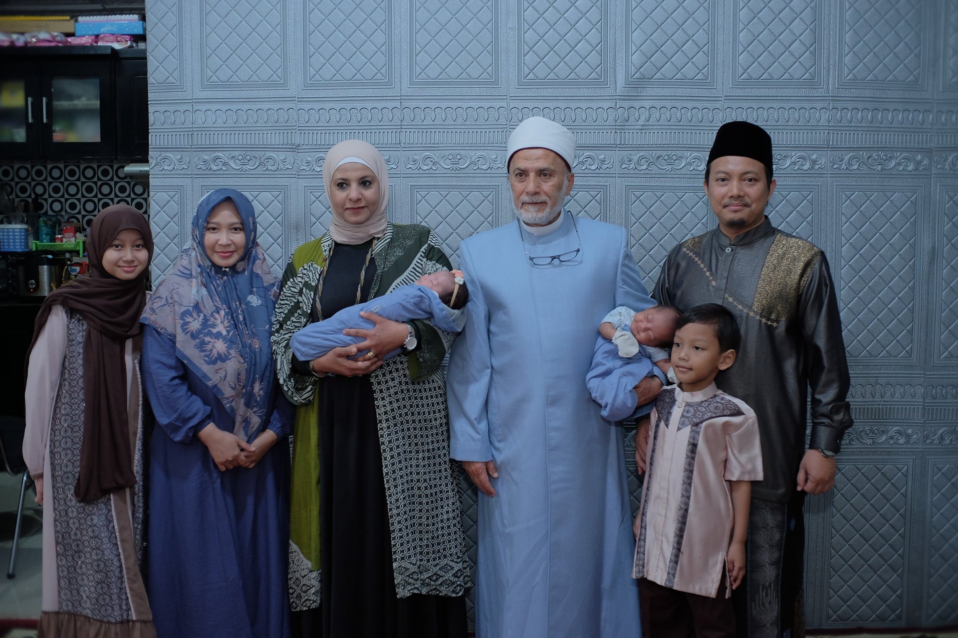 an abstract photo of a curved building with a blue sky in the background