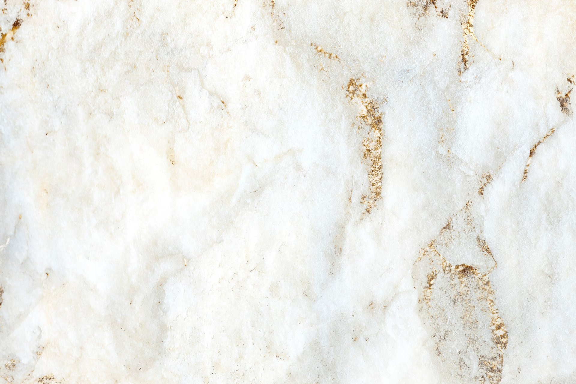 a close up of a white marble surface
